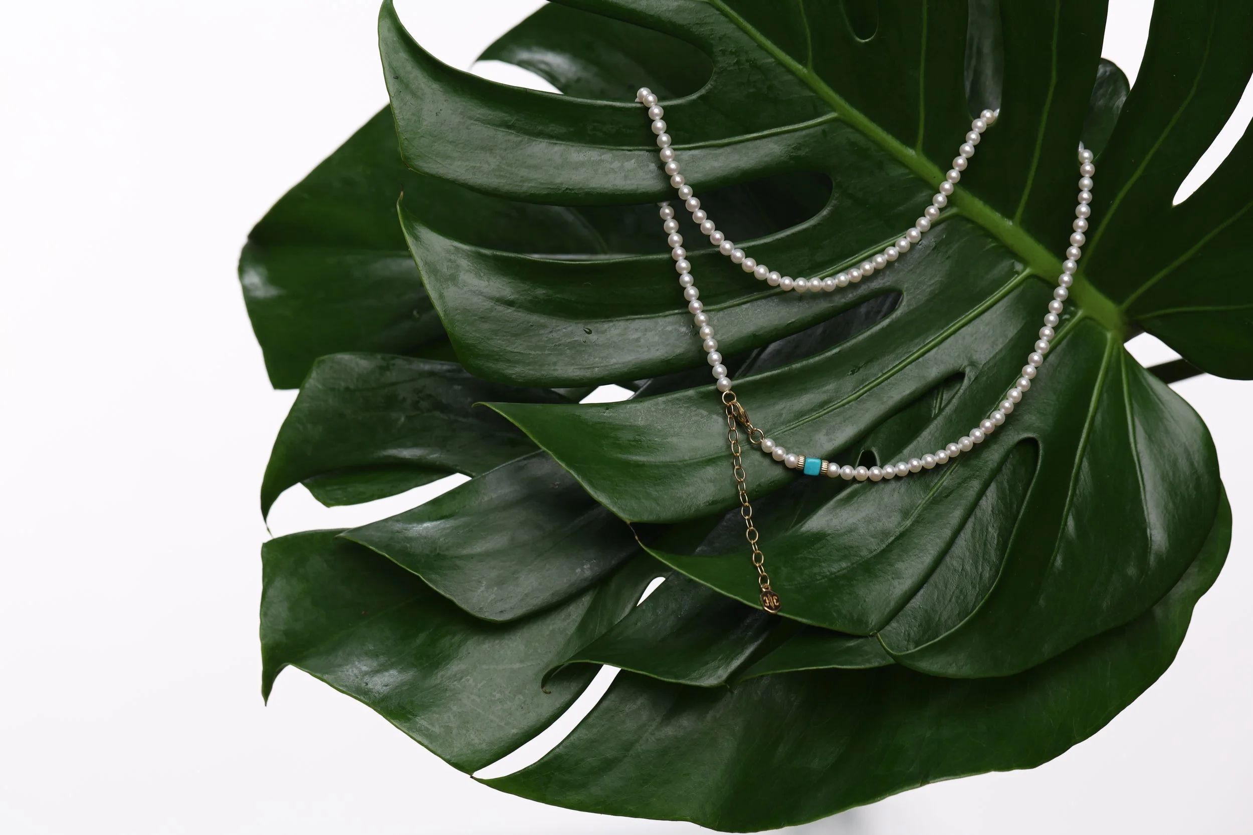 Shop Hanaureum Necklaces, White Pearl 14k Gold Necklace with Turquoise accent on leaf