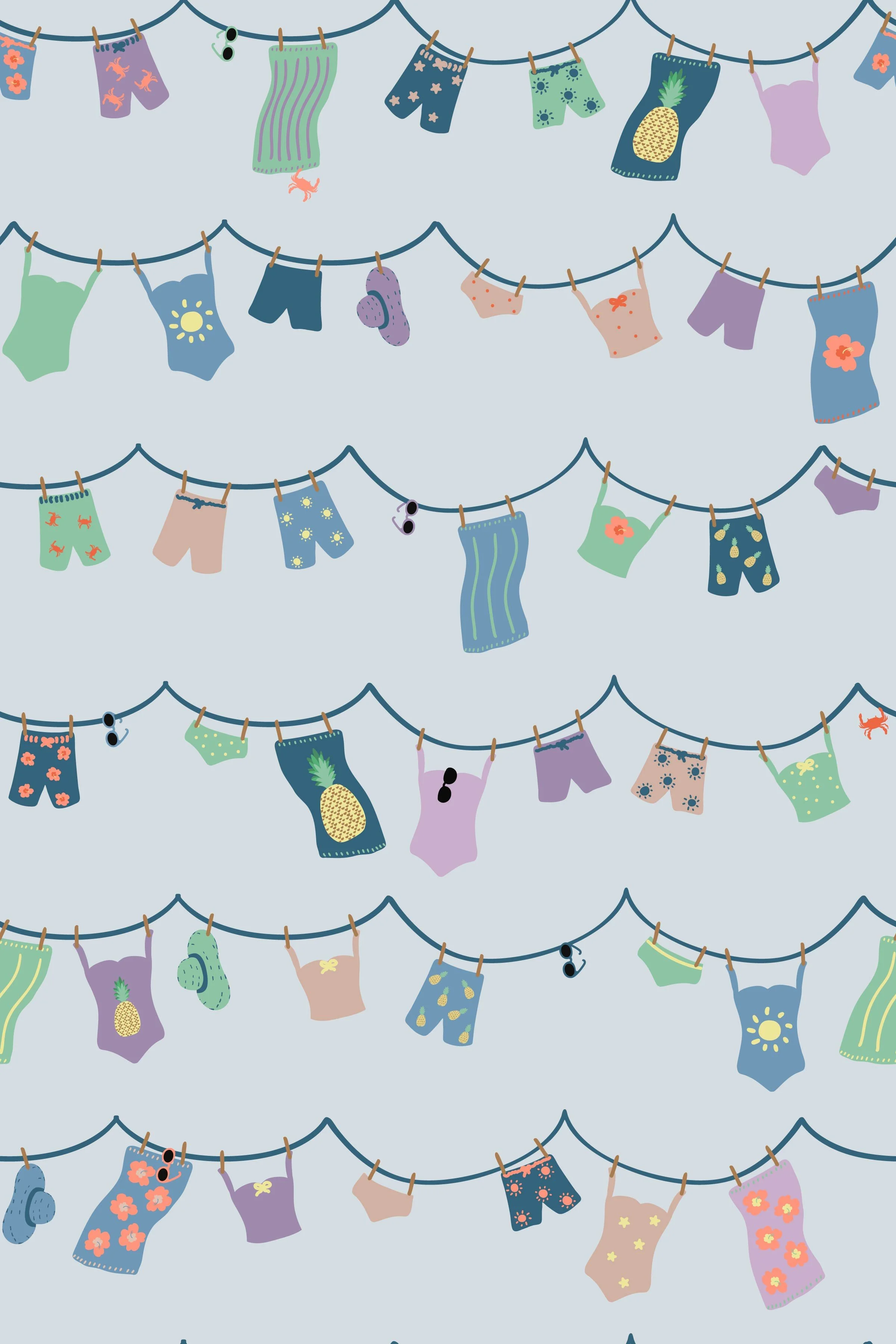 Pattern design swatch for fabric and wallpaper featuring pastel colored cute swimsuits, beach towels, bikini bottoms and tankini tops, sunglasses, and sun hats hanging from a laundry line. Sky blue background. 