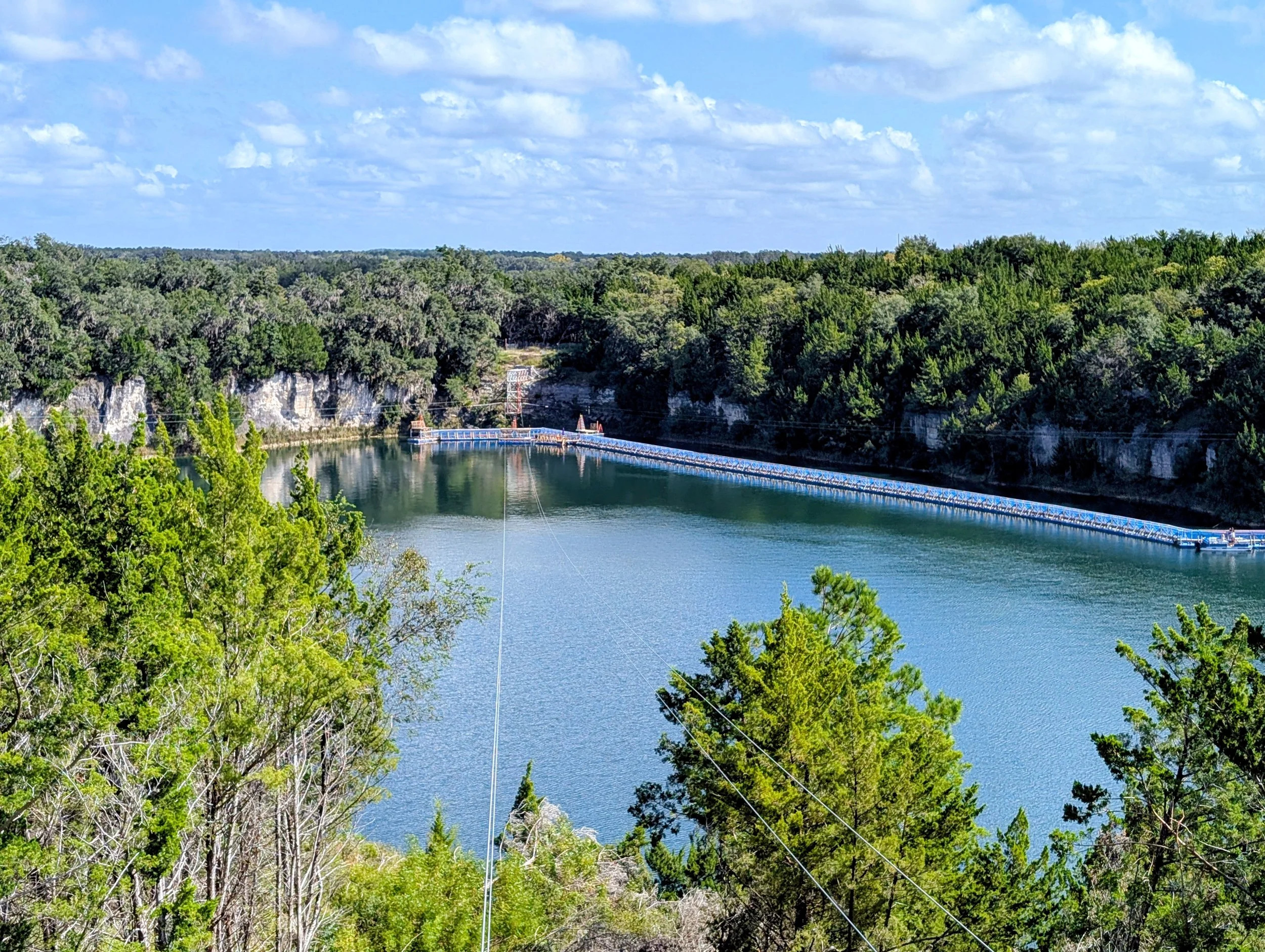 An overlook view of our longest zipline, the Double Dragon, which goes over our quarry. Click this image to Book Now.
