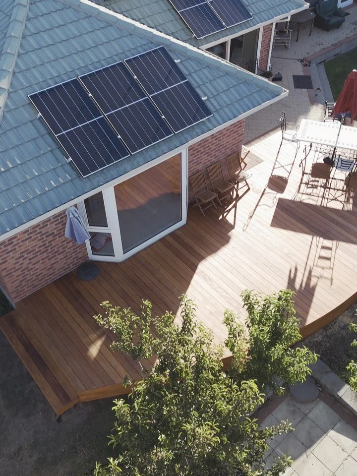 Curved Garapa Hardwood Deck. Full boards with no joins. Pre oiled with the best decking oil CD50. Clients stoked with the quality of work