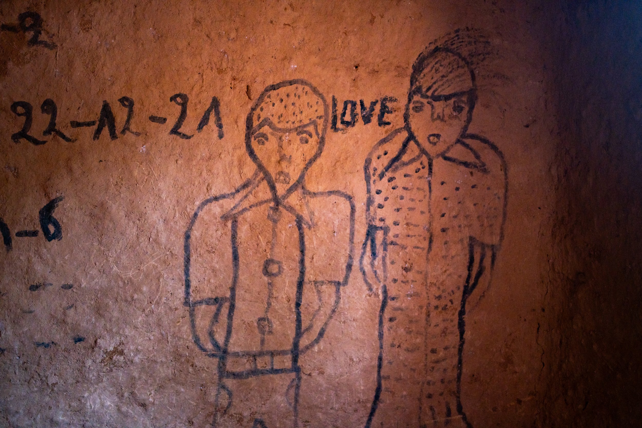 Drawings on the wall of a house on Nkombo Island in Rwanda. Located amidst the waters of Lake Kivu, the island was relatively spared by the genocide; three people were killed
there. Many families managed to flee to neighboring the Democratic Republic