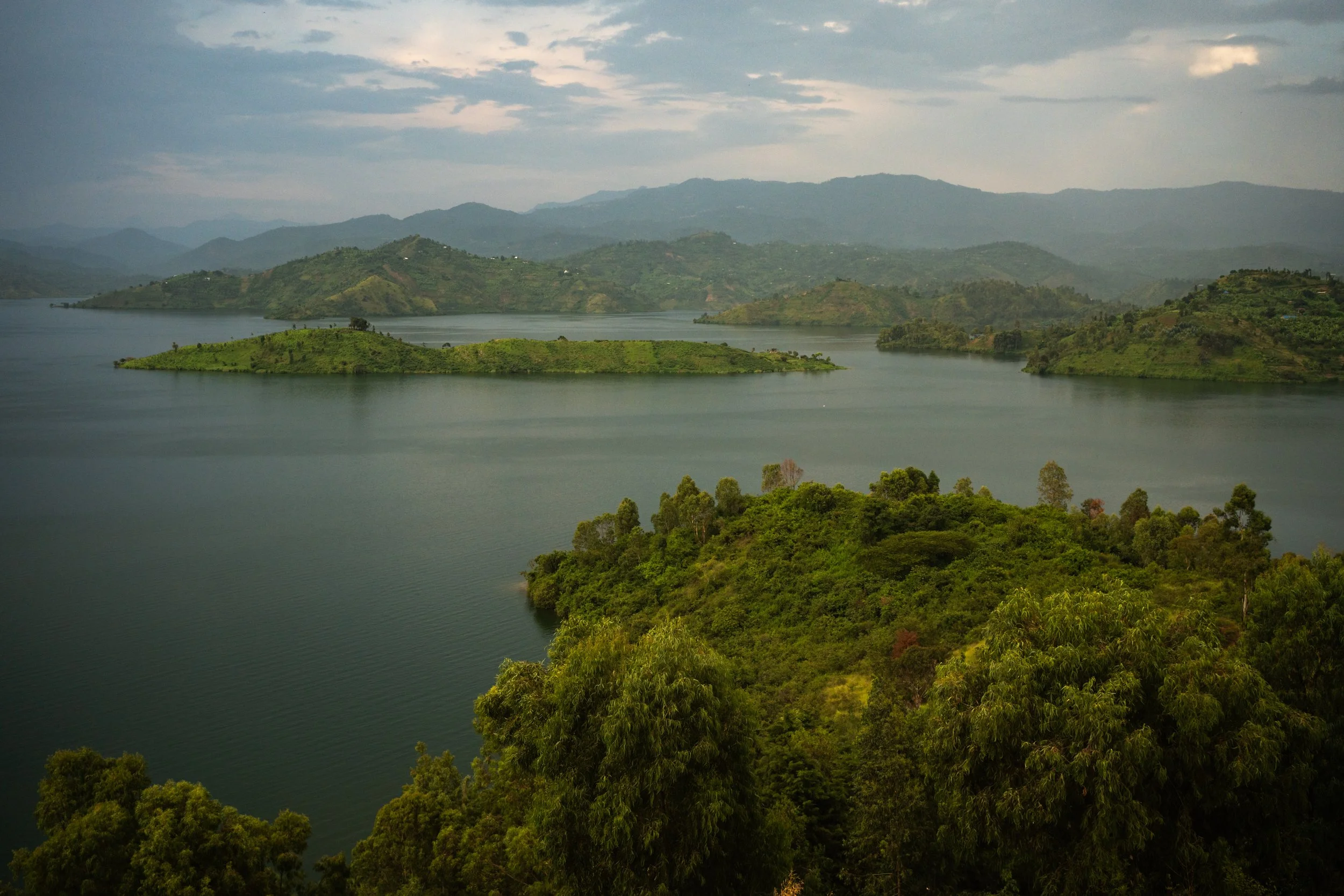 Kibuye, Rwanda.  According to legend, a mysterious mermaid goddess inhabits the depths of Lake Kivu, seducing men with her enchanting charm. Those who succumb to her call are lured into a cave filled with deadly gas.