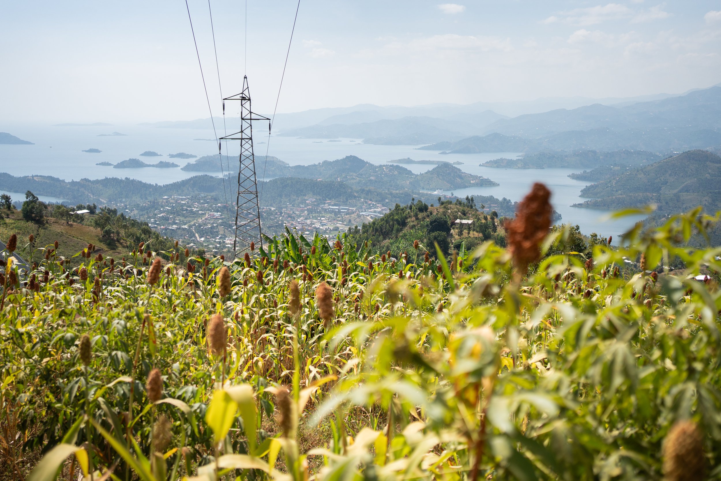 A high-tension power line towers above Lake Kivu, in the Karongi district of Rwanda.