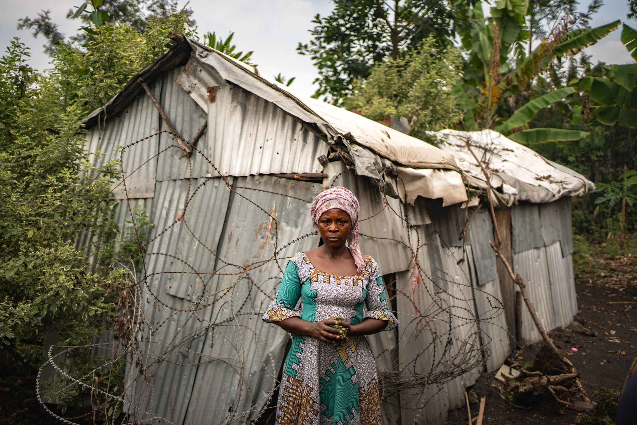 Fora, 35, stands in front of a warehouse next to her home. "My husband was there when the bomb fell, and he is still in the hospital. I feel really sad, my house was also destroyed.
I don’t know if there is peace now, but at least there are no more b
