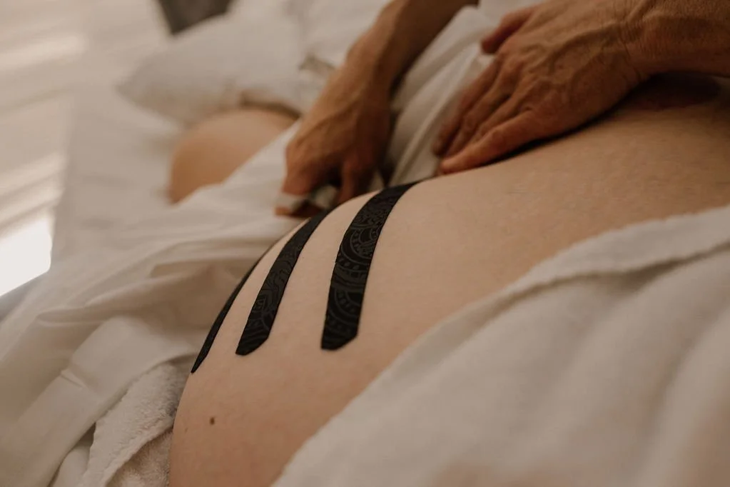 Peak performance massage pregnancy strapping