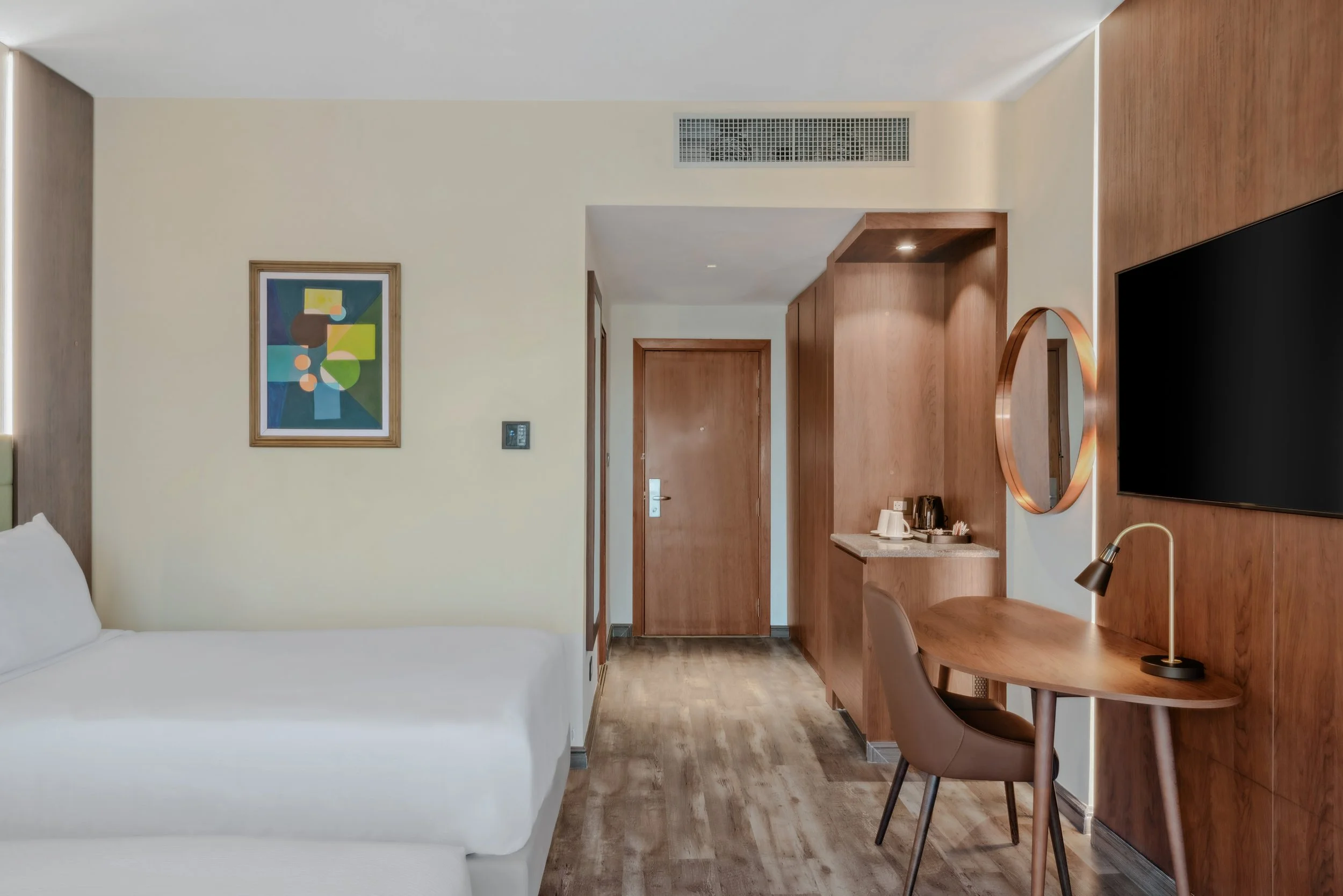 Hotel photography of hilton addis ababa airport in africa by miguel gomes professional hotel and hospitality photographer. photography featuring architecture and interior design of a luxury bedroom from the interior. Located in Ethiopia, Africa.