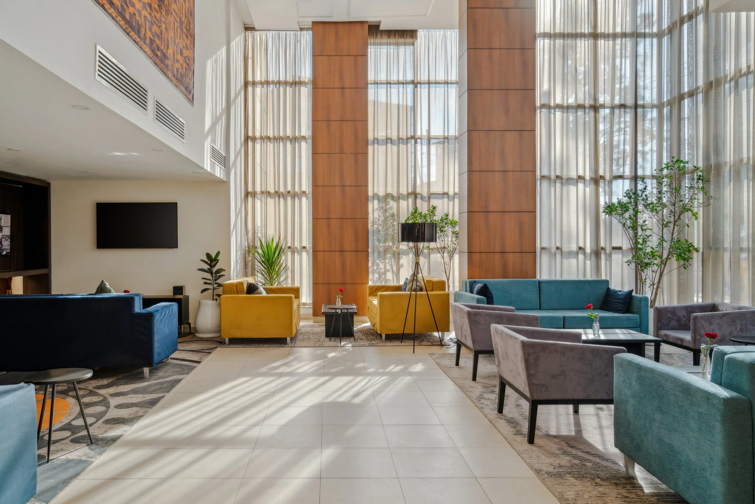 hotel photography of hilton addis ababa airport in africa by miguel gomes professional hotel and hospitality photographer. photography featuring interior design and architecture of lounge from the interior.