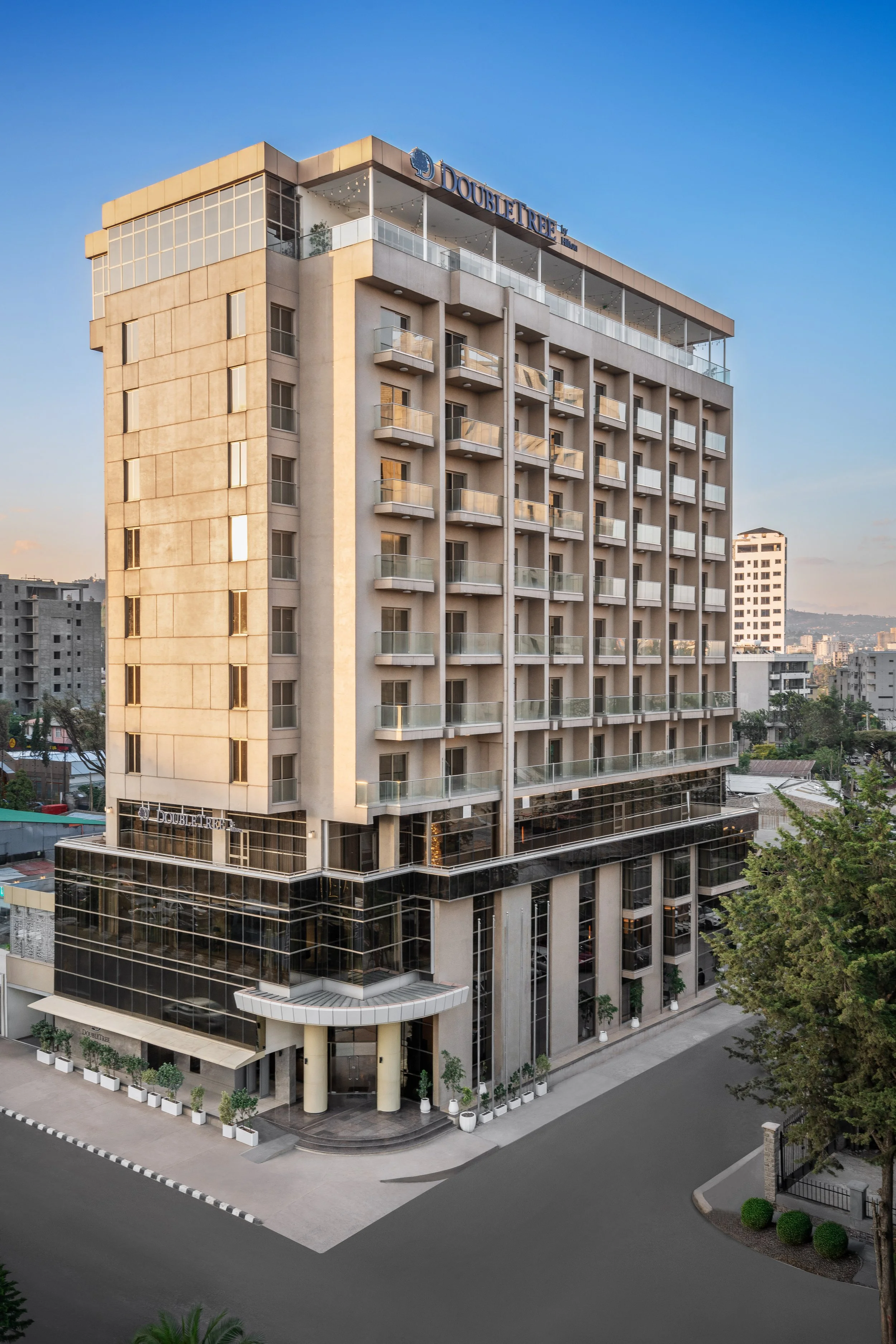 hotel photography of hilton addis ababa airport in africa by miguel gomes professional hotel and hospitality photographer. photography featuring the building of the hotel from the exterior.