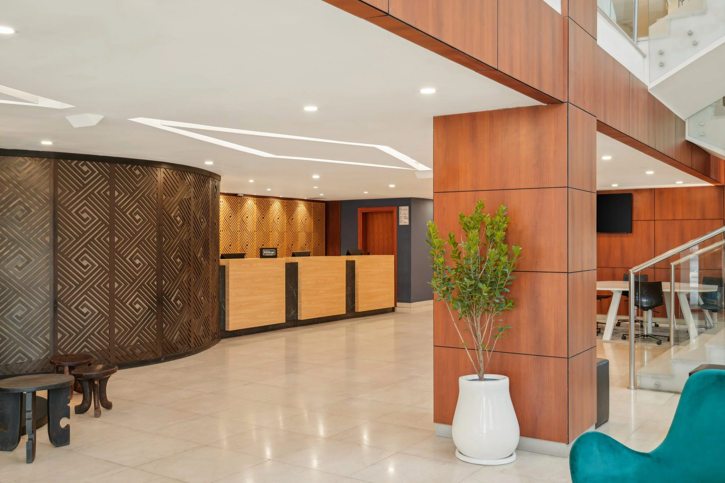 hotel photography of hilton addis ababa airport in africa by miguel gomes professional hotel and hospitality photographer. photography featuring interior design and architecture of reception from the interior.