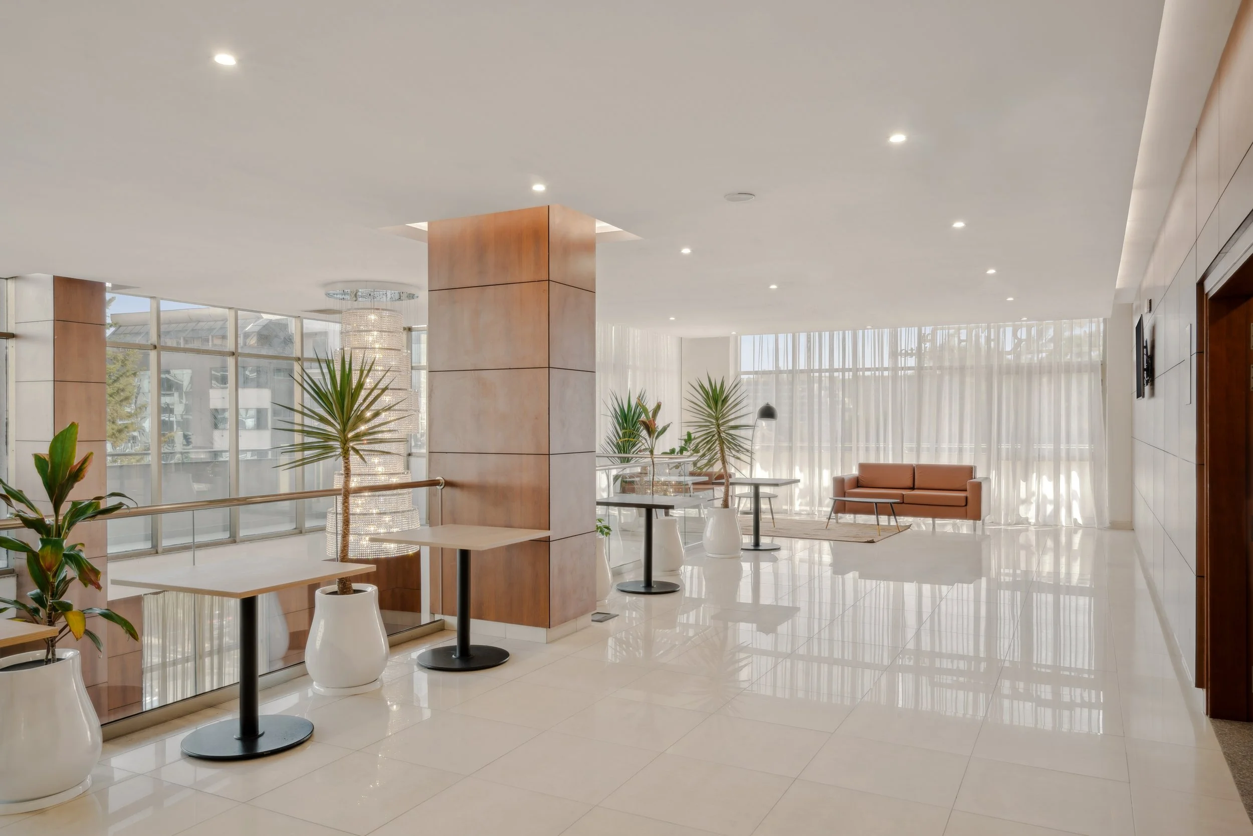 Hotel photography of hilton addis ababa airport in africa by miguel gomes professional hotel and hospitality photographer. photography featuring architecture and interior design of a meeting room break area from the interior.