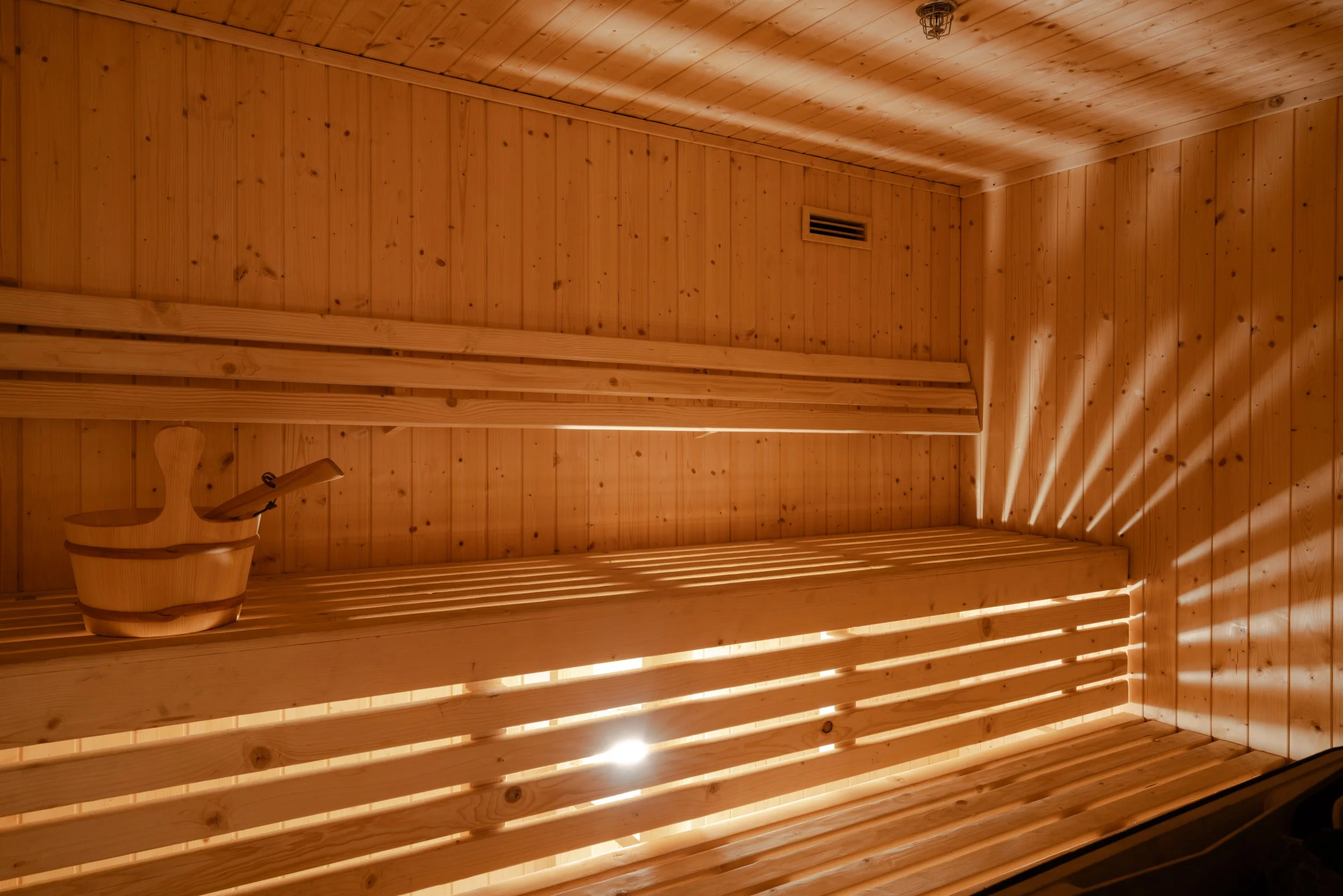 Hotel photography of hilton addis ababa airport in africa by miguel gomes professional hotel and hospitality photographer. photography featuring architecture and interior design of a luxury sauna from the interior. Located in Ethiopia, Africa.