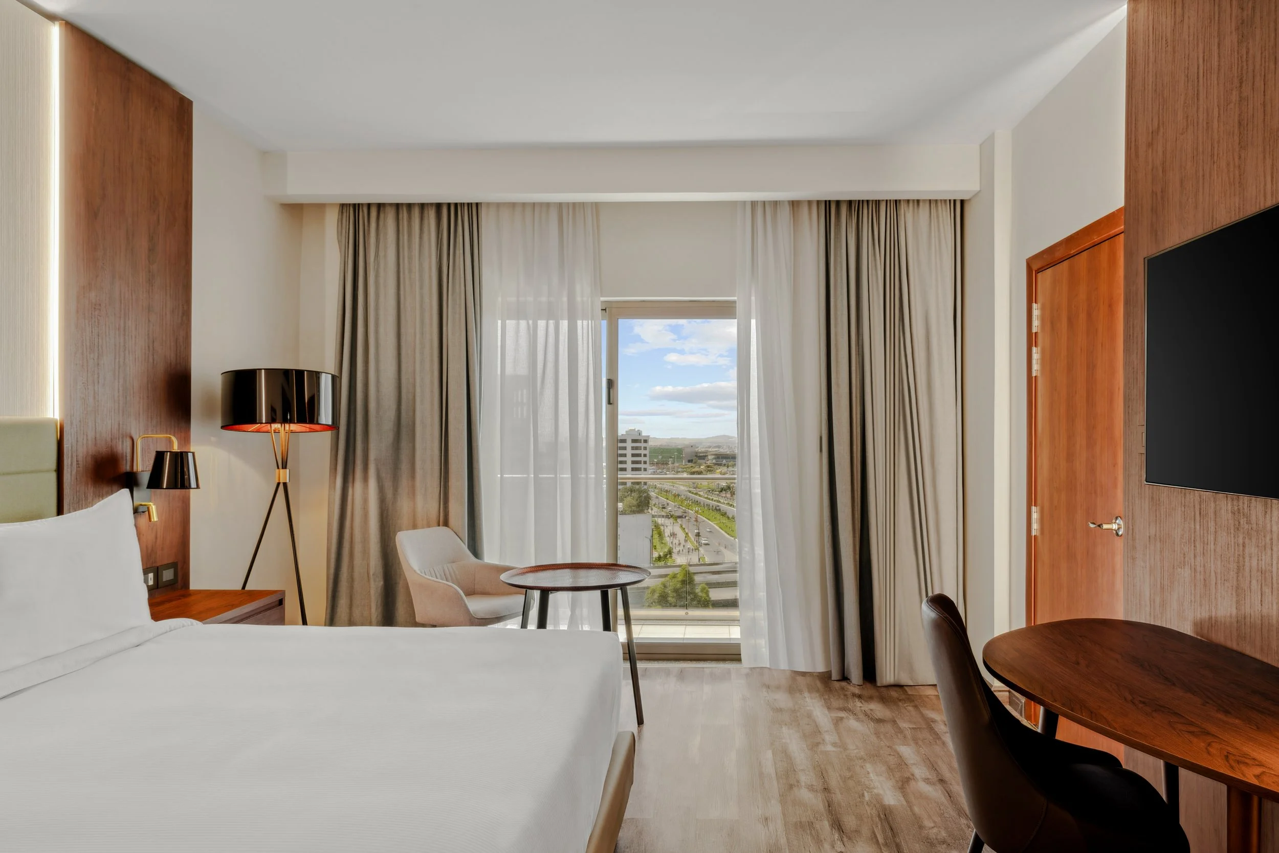 Hotel photography of hilton addis ababa airport in africa by miguel gomes professional hotel and hospitality photographer. photography featuring architecture and interior design of a luxury bedroom from the interior. Located in Ethiopia, Africa.