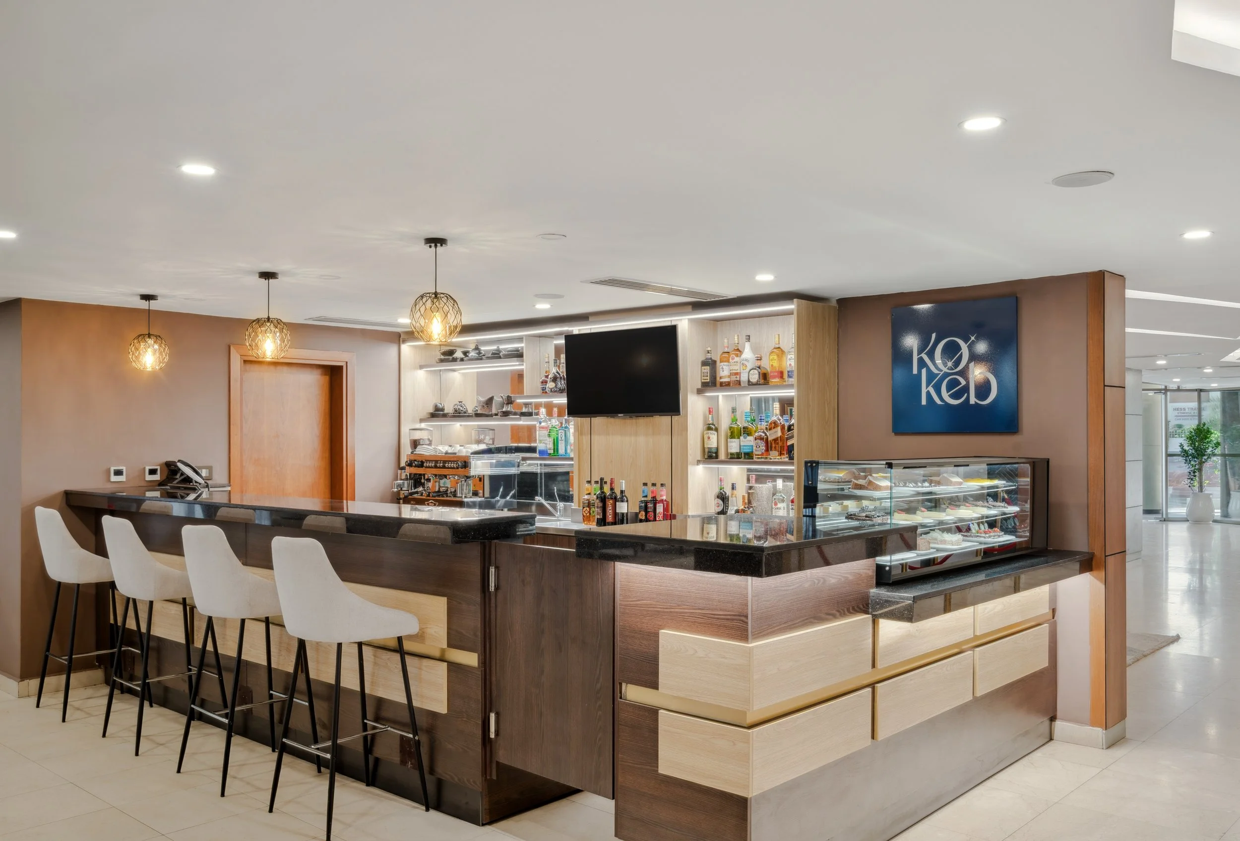 Hotel photography of hilton addis ababa airport in africa by miguel gomes professional hotel and hospitality photographer. photography featuring architecture and interior design of the lounge from the interior.