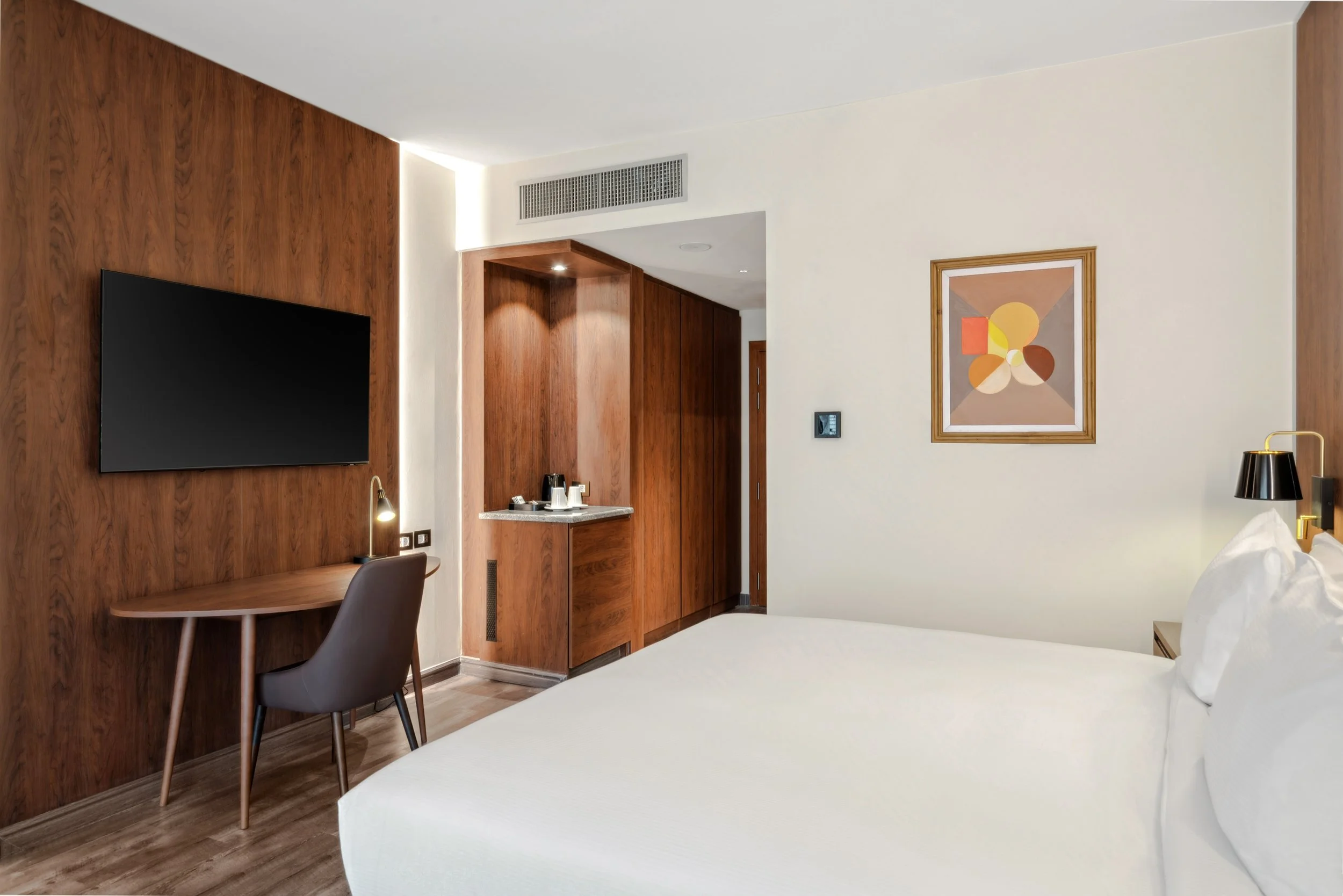 Hotel photography of hilton addis ababa airport in africa by miguel gomes professional hotel and hospitality photographer. photography featuring architecture and interior design of a luxury bedroom from the interior. Located in Ethiopia, Africa.
