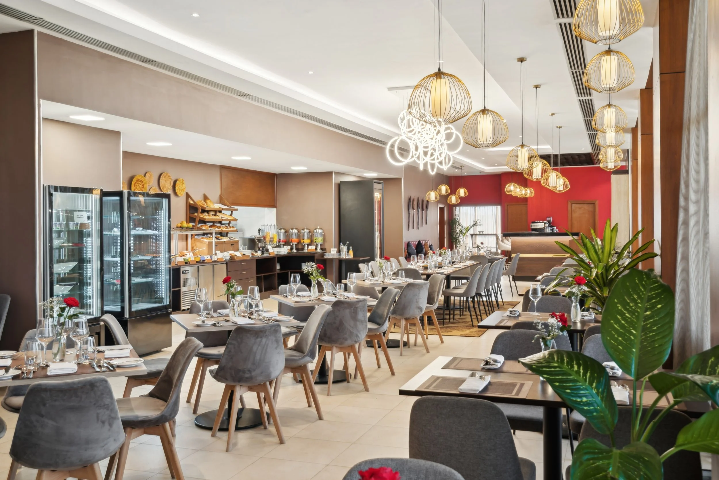 Hotel photography of hilton addis ababa airport in africa by miguel gomes professional hotel and hospitality photographer. photography featuring architecture and interior design of a luxury restaurant from the interior. Located in Ethiopia, Africa.