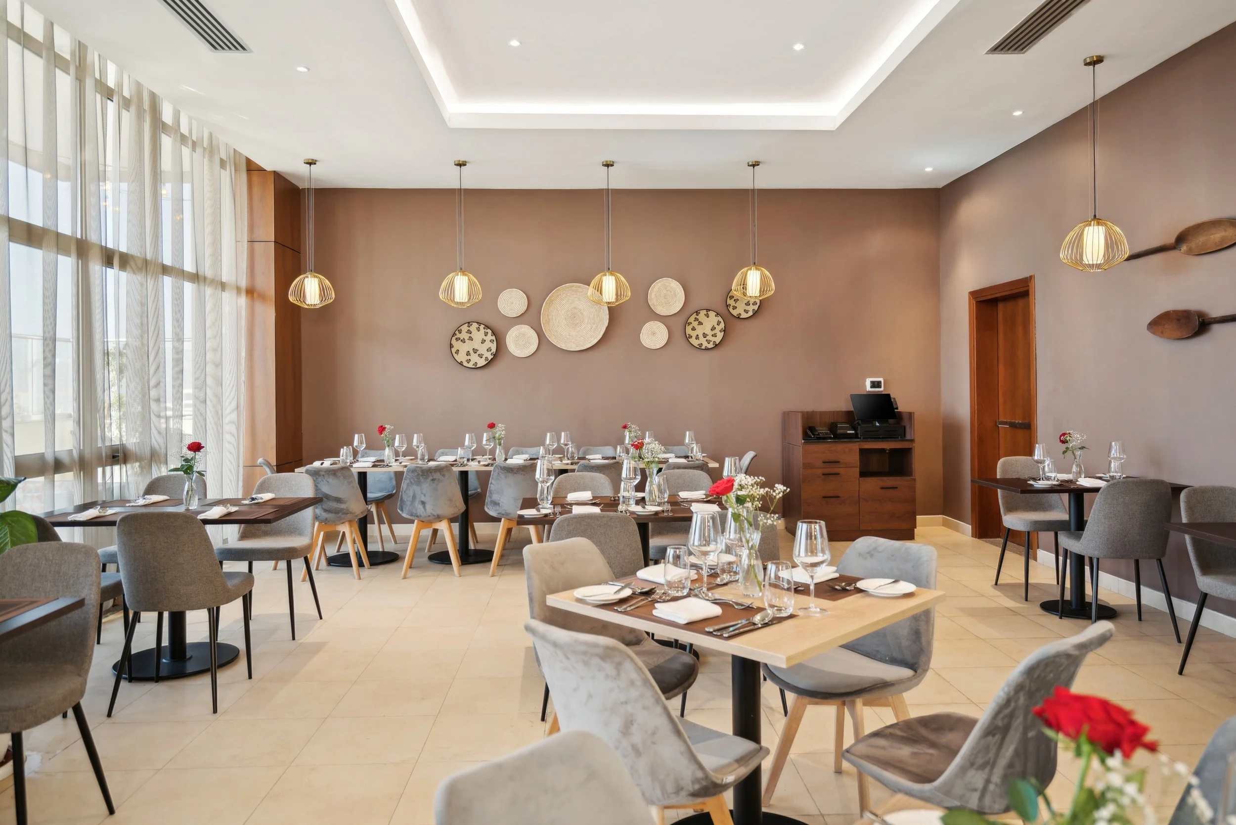 Hotel photography of hilton addis ababa airport in africa by miguel gomes professional hotel and hospitality photographer. photography featuring architecture and interior design of a luxury restaurant from the interior. Located in Ethiopia, Africa.