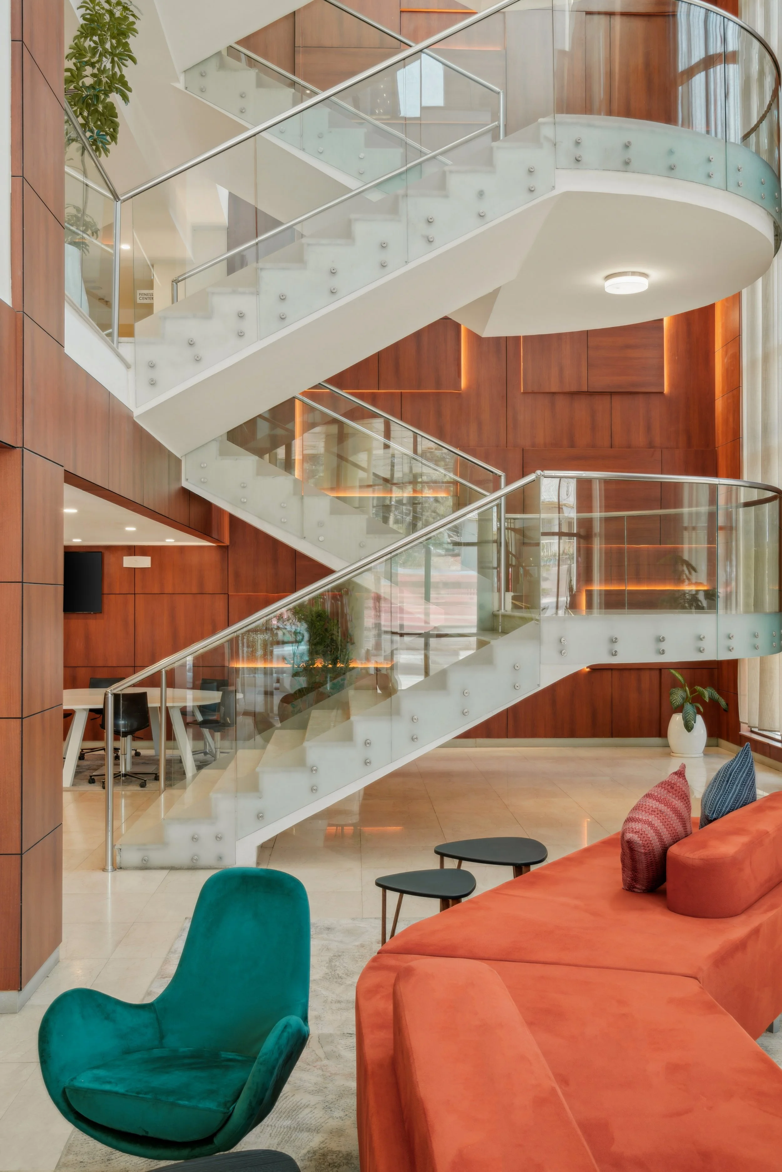 hotel photography of hilton addis ababa airport in africa by miguel gomes professional hotel and hospitality photographer. photography featuring the lobby staircase from the interior.