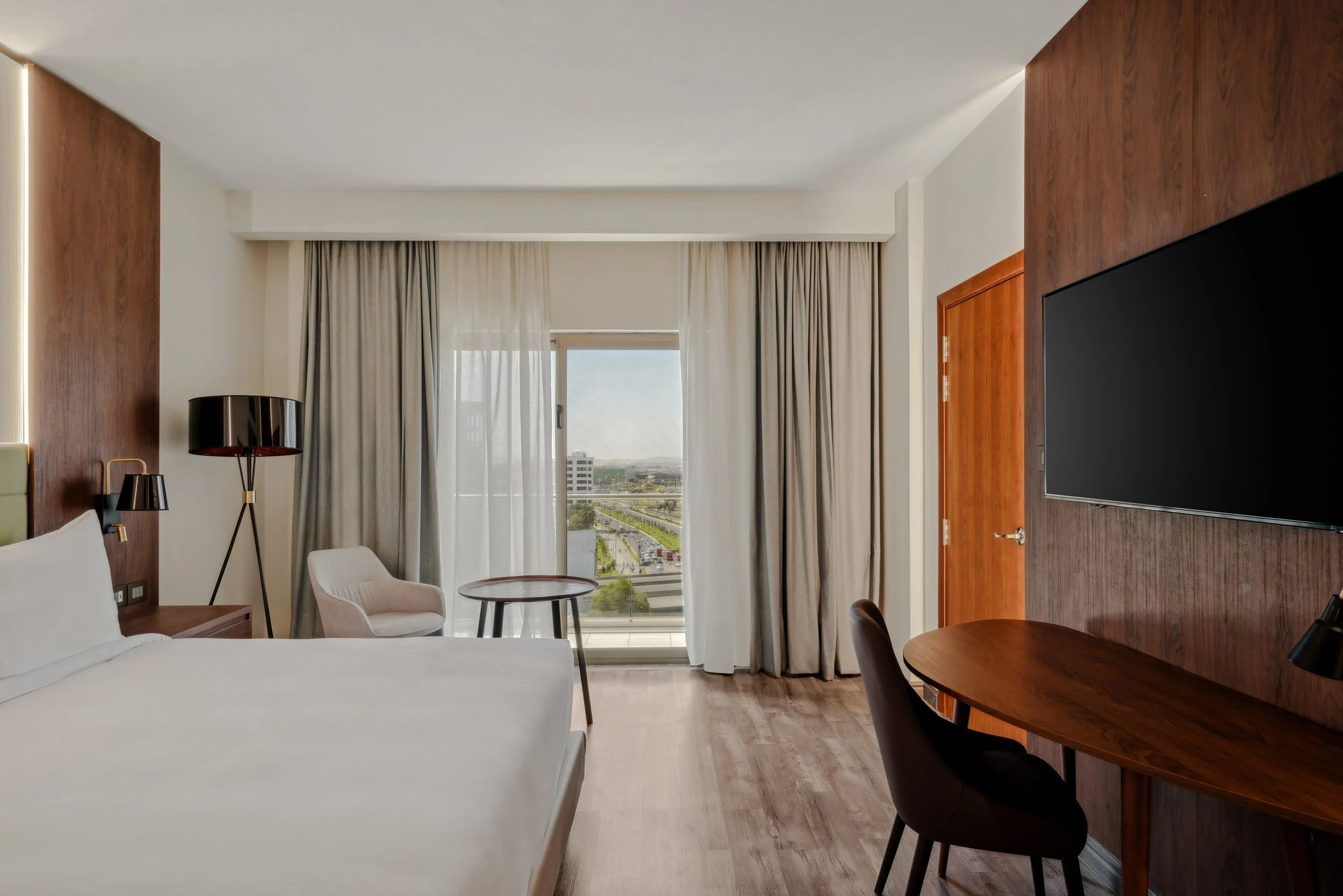 Hotel photography of hilton addis ababa airport in africa by miguel gomes professional hotel and hospitality photographer. photography featuring architecture and interior design of a luxury bedroom from the interior. Located in Ethiopia, Africa.