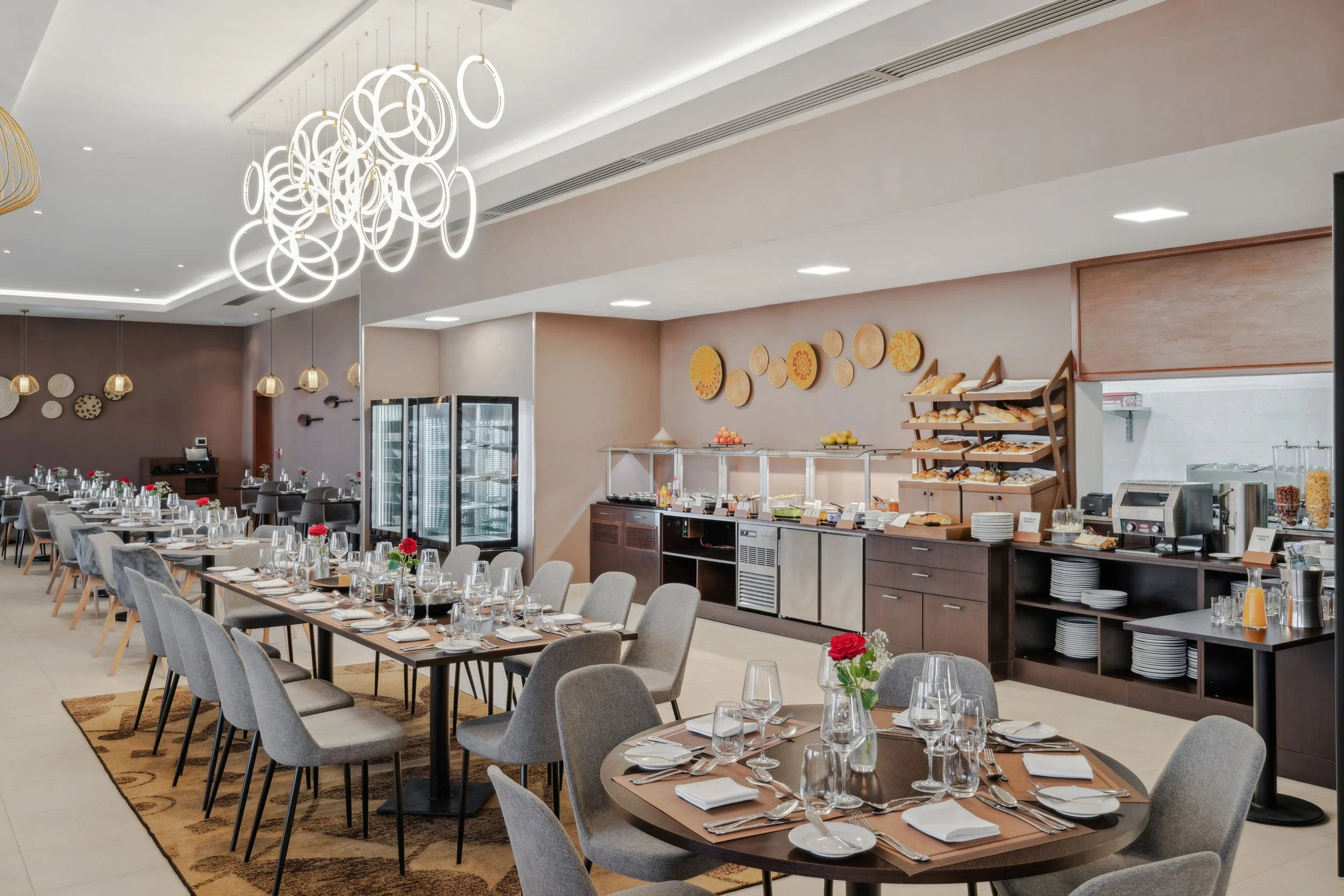 Hotel photography of hilton addis ababa airport in africa by miguel gomes professional hotel and hospitality photographer. photography featuring architecture and interior design of a luxury restaurant from the interior. Located in Ethiopia, Africa.