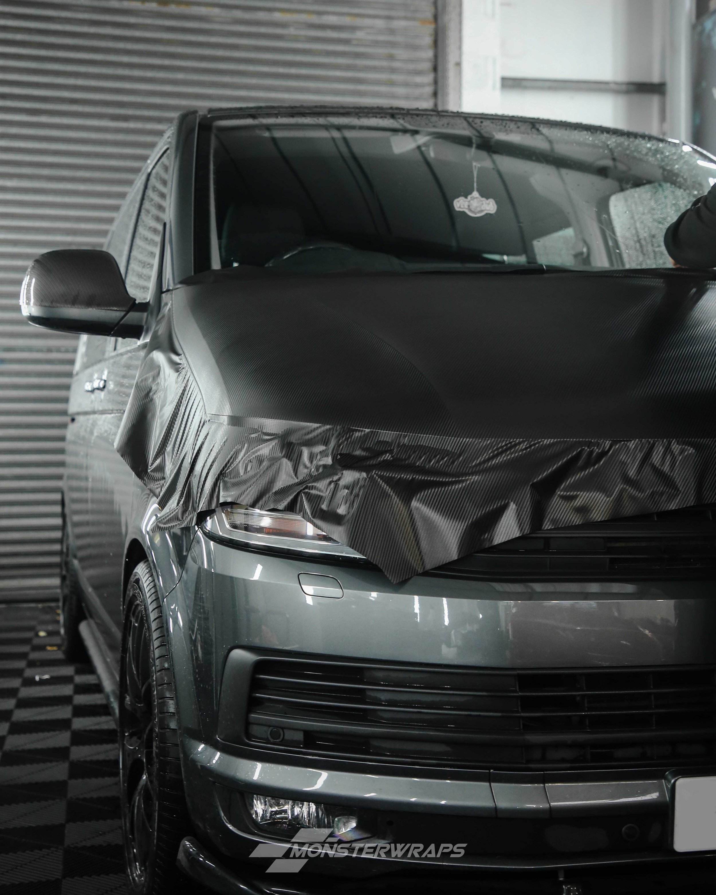 vw transporter t6 bonnet wrapped in 3M textured black carbon fibre