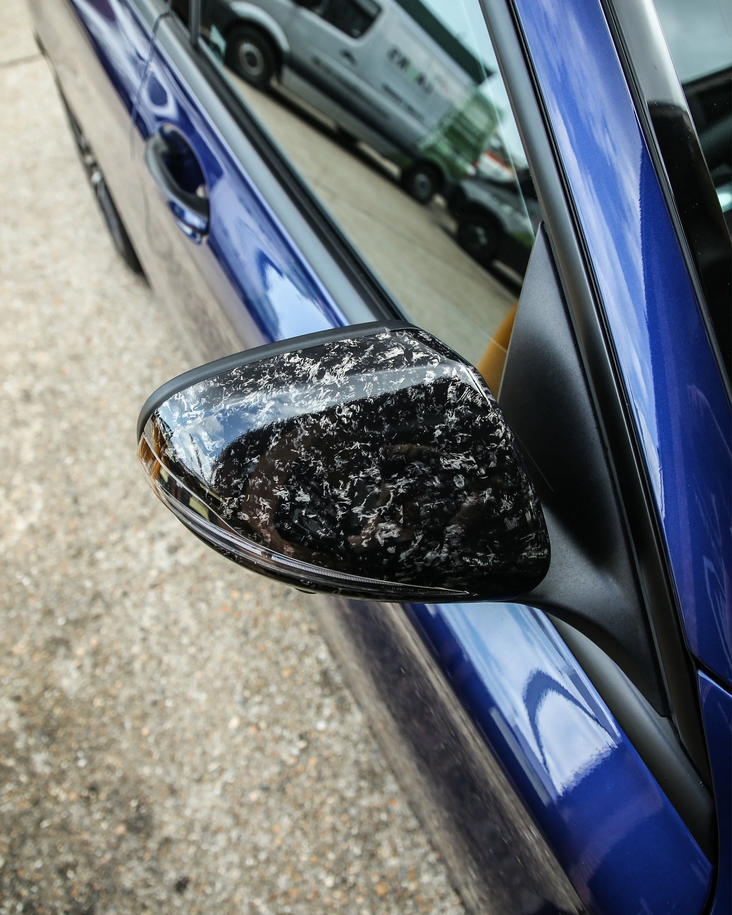 mercedes AMG C43 wing mirrors and splitter wrapped in 3M high gloss forged carbon wrapping vinyl