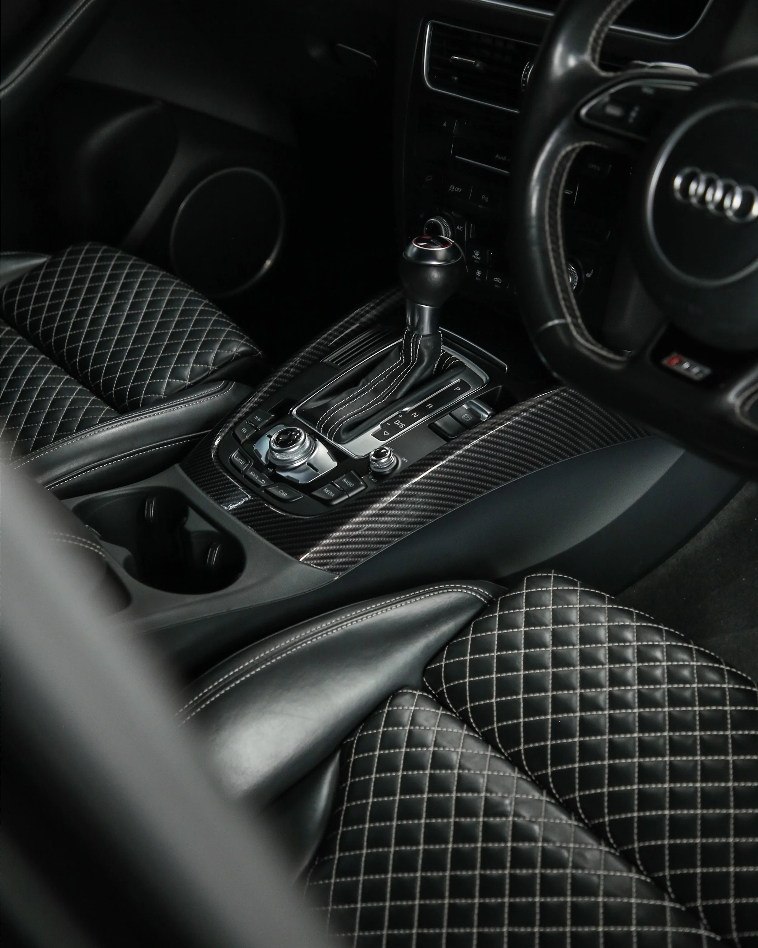 audi Q5 SQ5 interior trims centre console wrapped in 3M gloss metallic carbon fibre wrapping vinyl