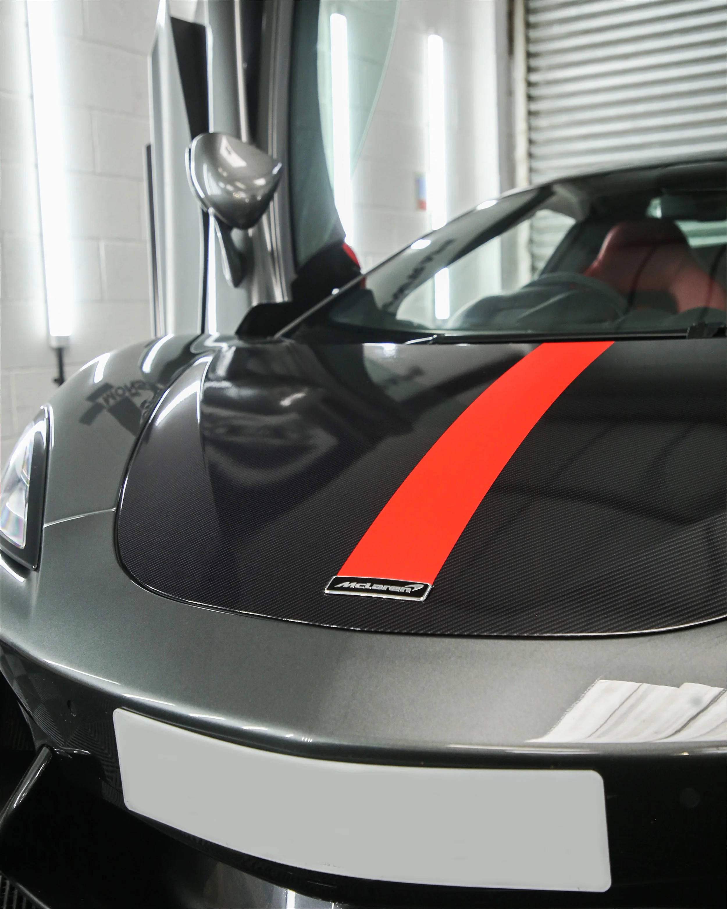 mclaren 570s bonnet wrapped in gloss carbon fibre 