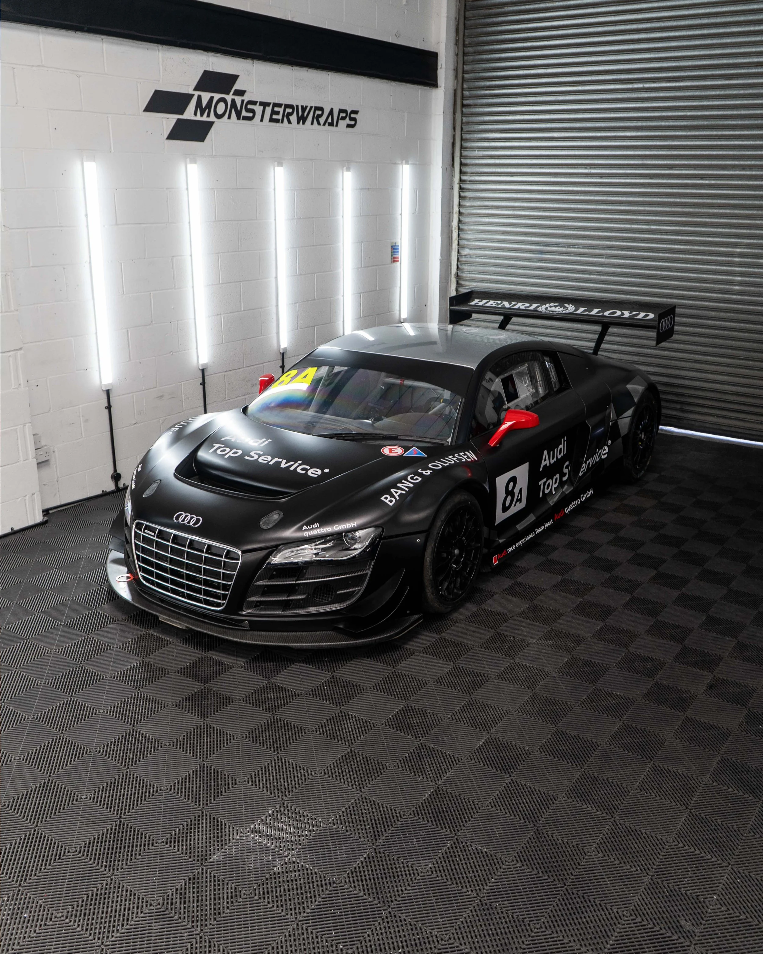 Audi R8 Gen 1 LMS GT3 race car full colour change wrap in 3M 2080 satin black with custom designed racing livery graphics applied on top