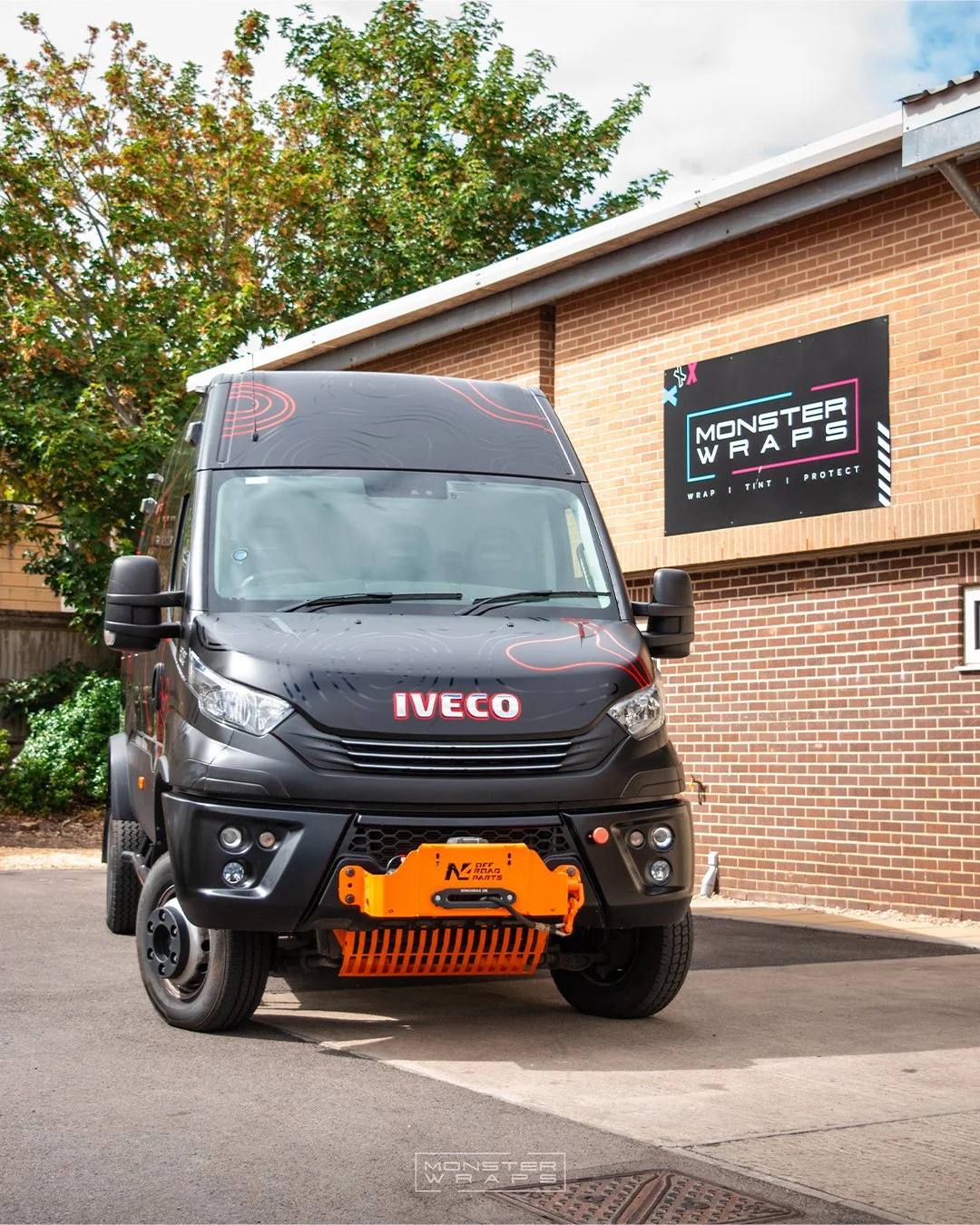 Iveco Daily 4x4 full external colour change vinyl wrap Oracal Matte Black with topographic graphics