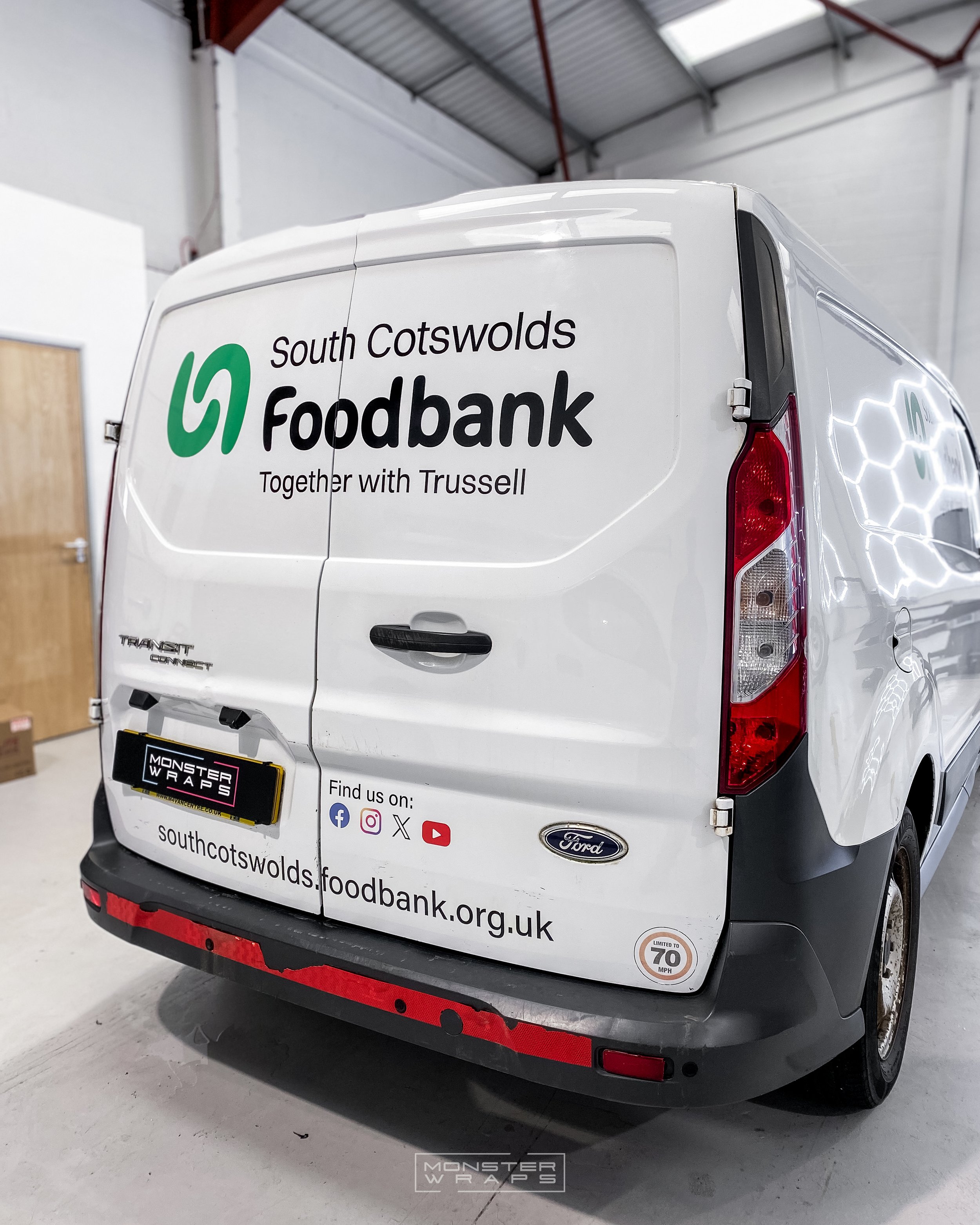 Ford Transit Connect foodbank sign-writing branded graphics