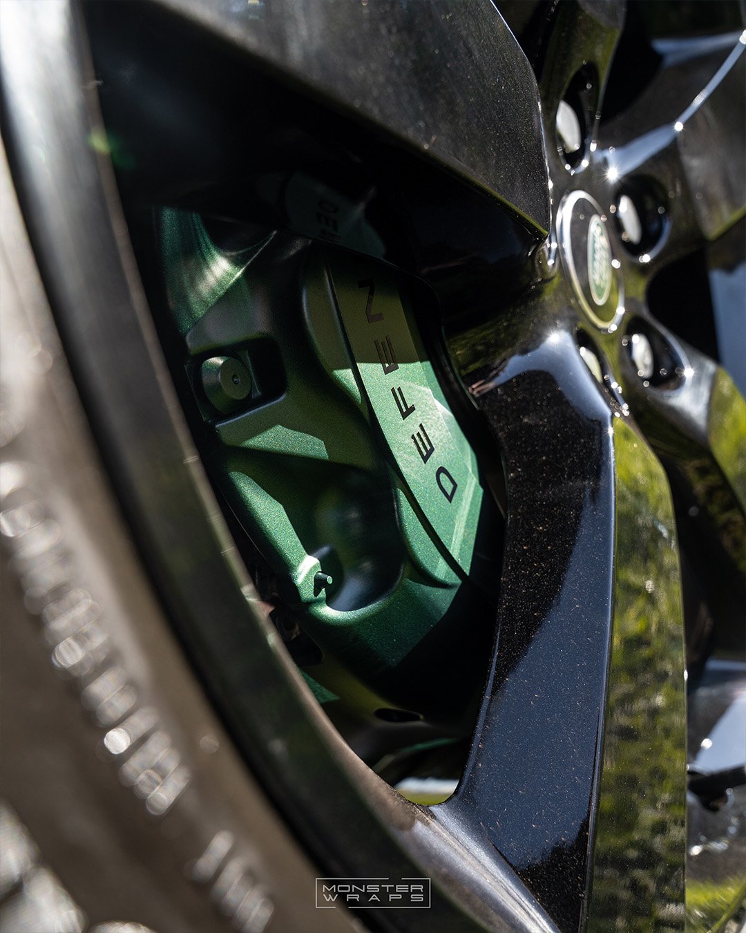 Land Rover Defender 110 lower-half full colour change vinyl wrap in 3M 2080 Matte Pine Green Metallic