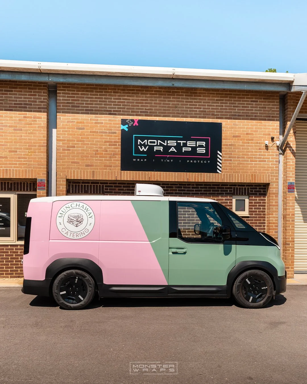 Munchtime Catering brand new Kia PV5 two-tone half and half green and pink commercial branded wrap