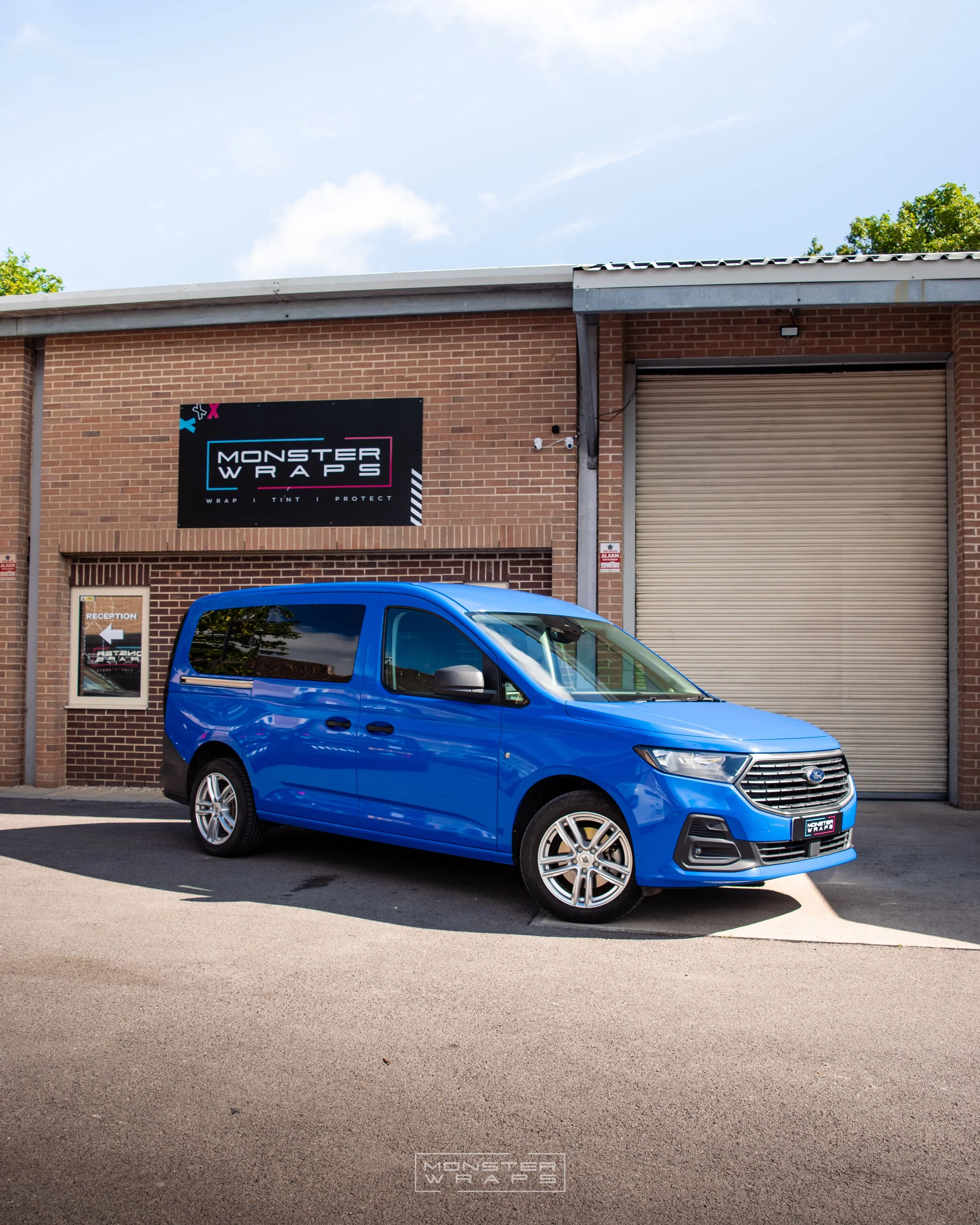 Ford Transit Connect full colour change van wrap Oracal gloss sea blue