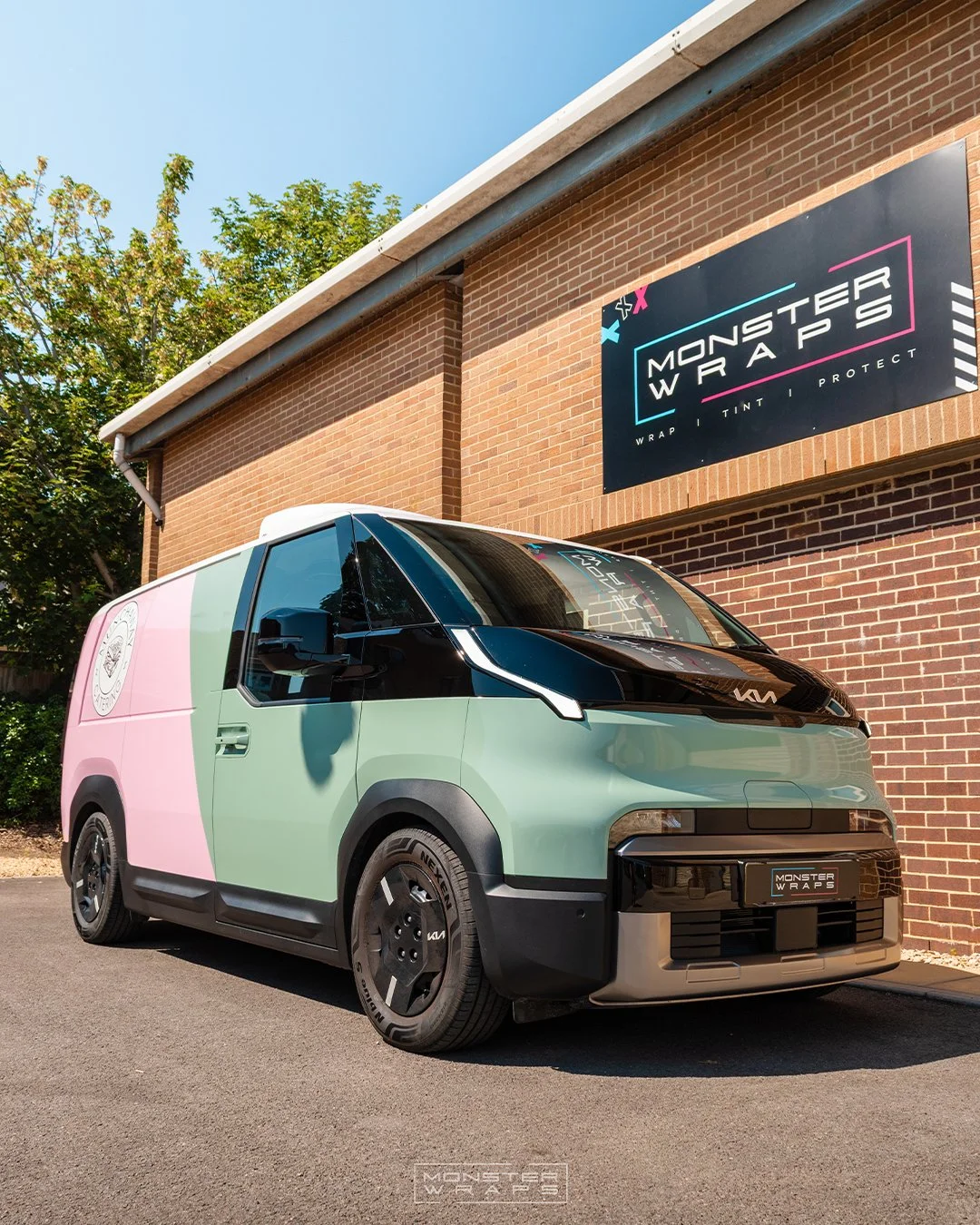 Munchtime Catering brand new Kia PV5 two-tone half and half green and pink commercial branded wrap