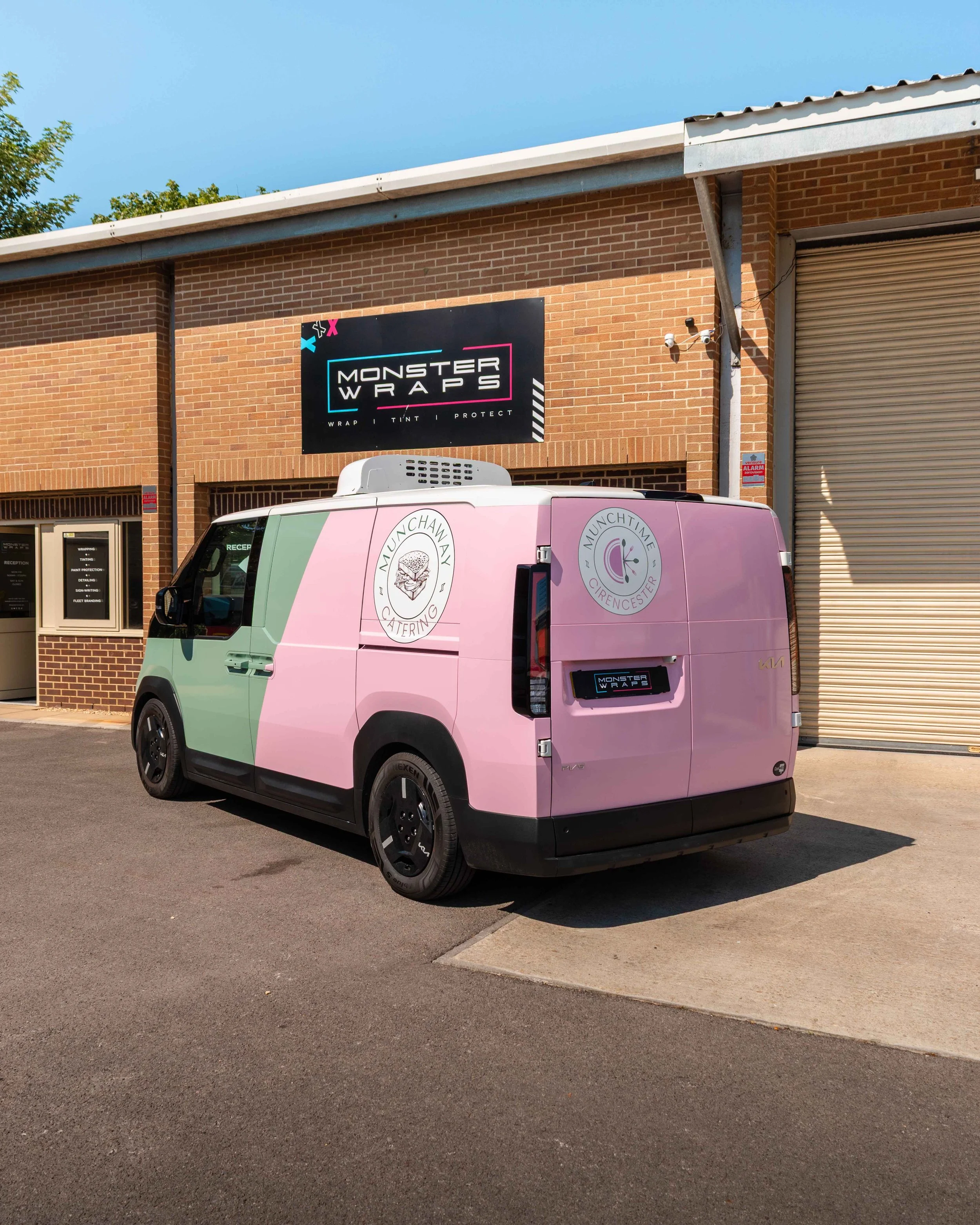 Munchtime Catering brand new Kia PV5 two-tone half and half green and pink commercial branded wrap
