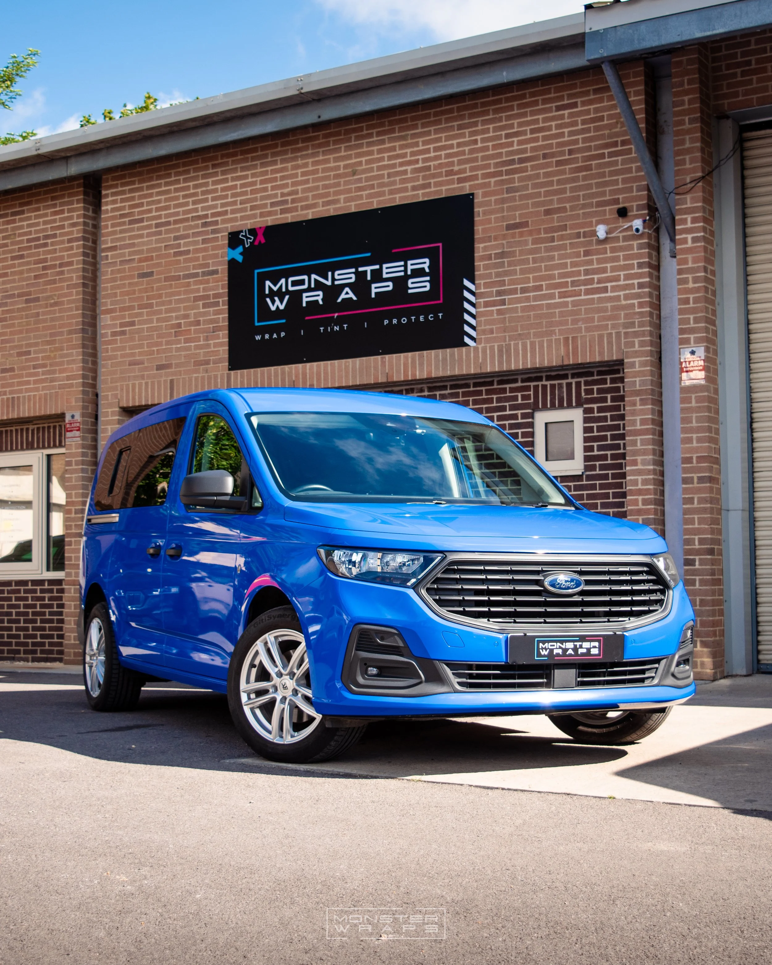Ford Transit Connect full colour change van wrap Oracal gloss sea blue