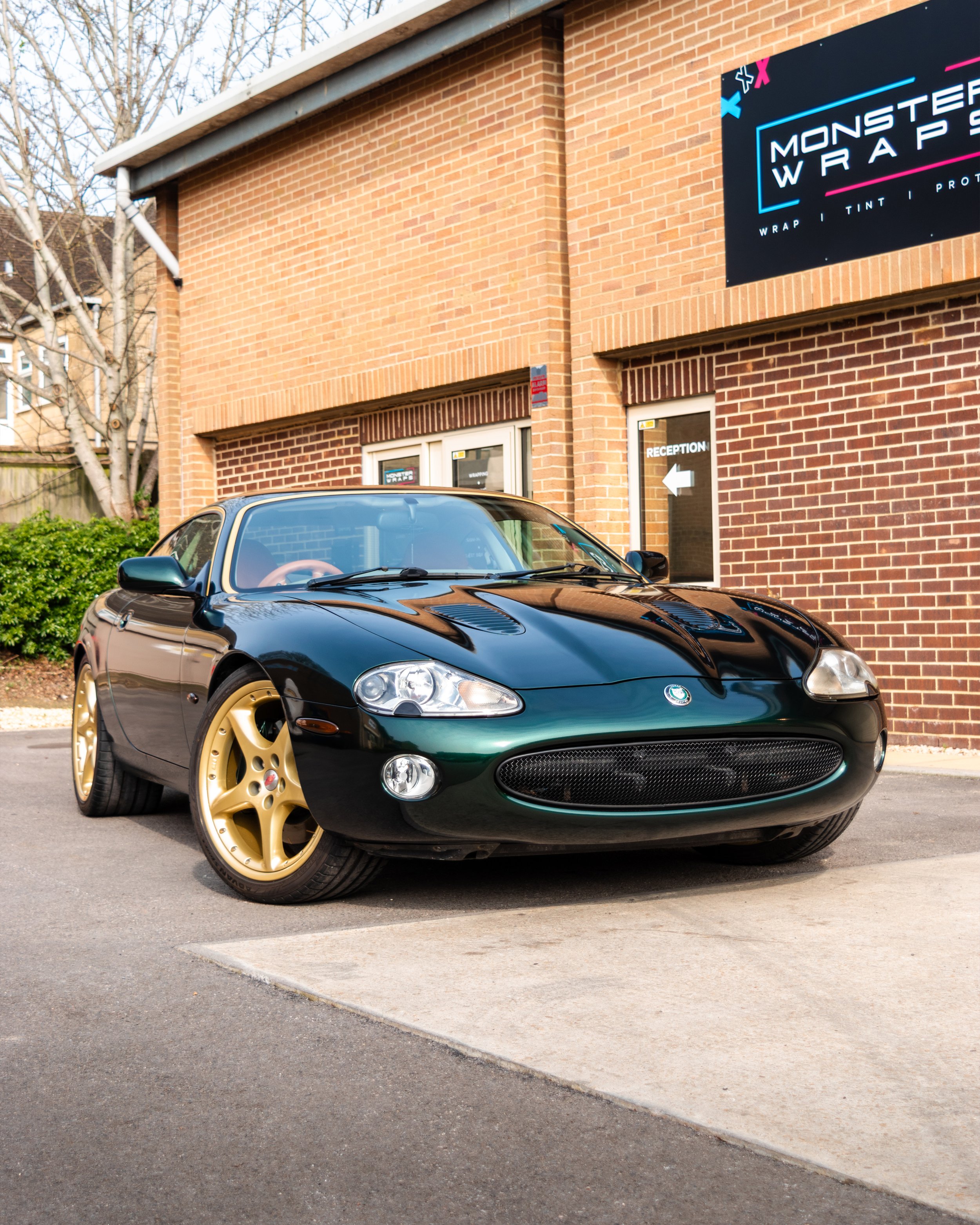 Jaguar XK8 full colour change vinyl wrap transformation gloss metallic british racing green