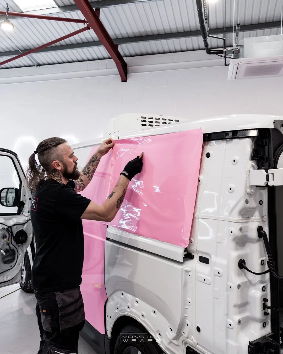 Munchtime Catering brand new Kia PV5 two-tone half and half green and pink commercial branded wrap