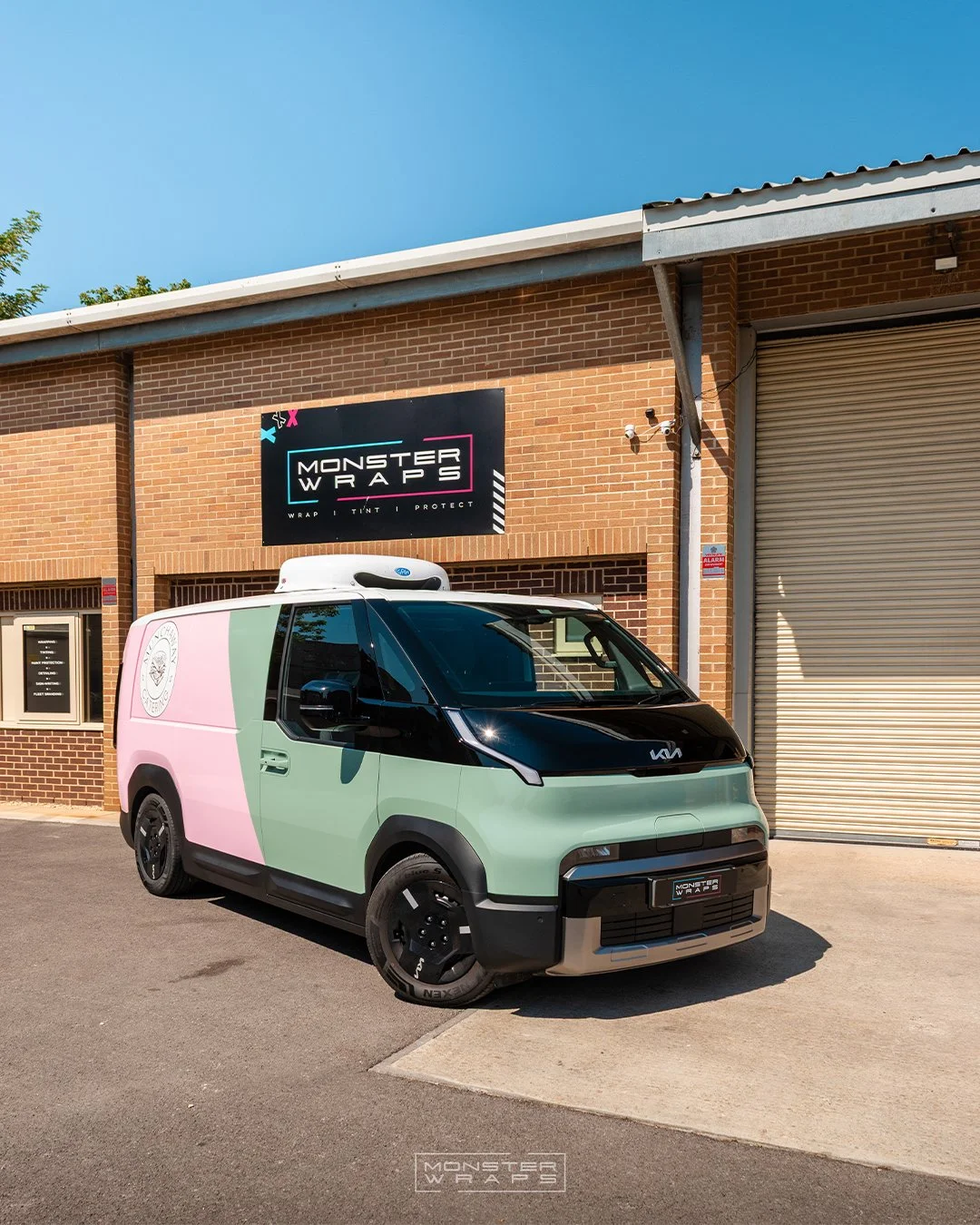 Munchtime Catering brand new Kia PV5 two-tone half and half green and pink commercial branded wrap