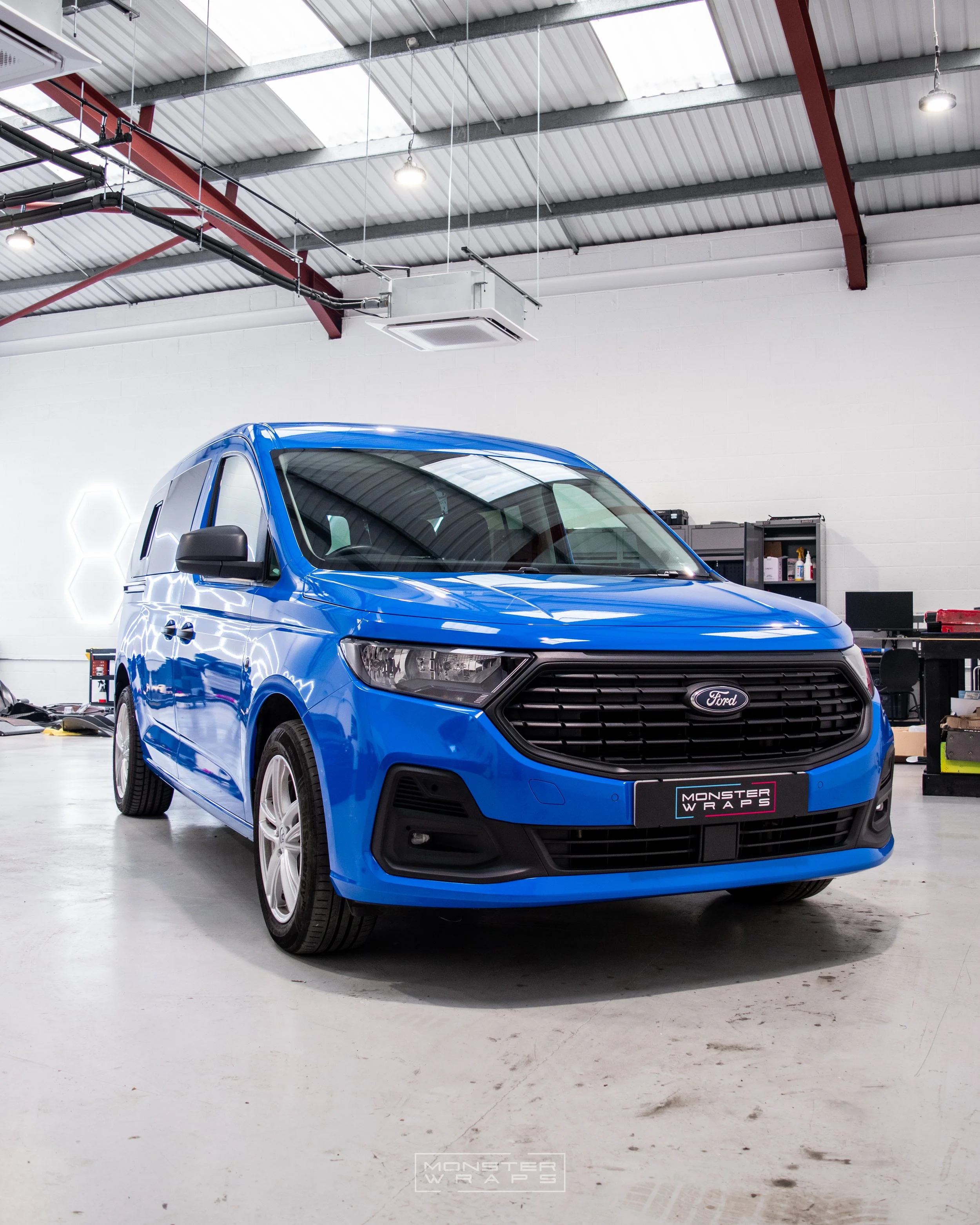 Ford Transit Connect full colour change van wrap Oracal gloss sea blue