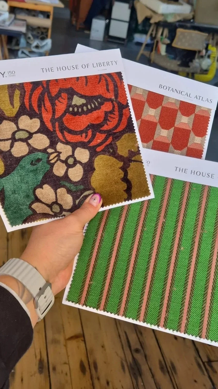 How do I choose the right fabric for reupholstering my sofa?