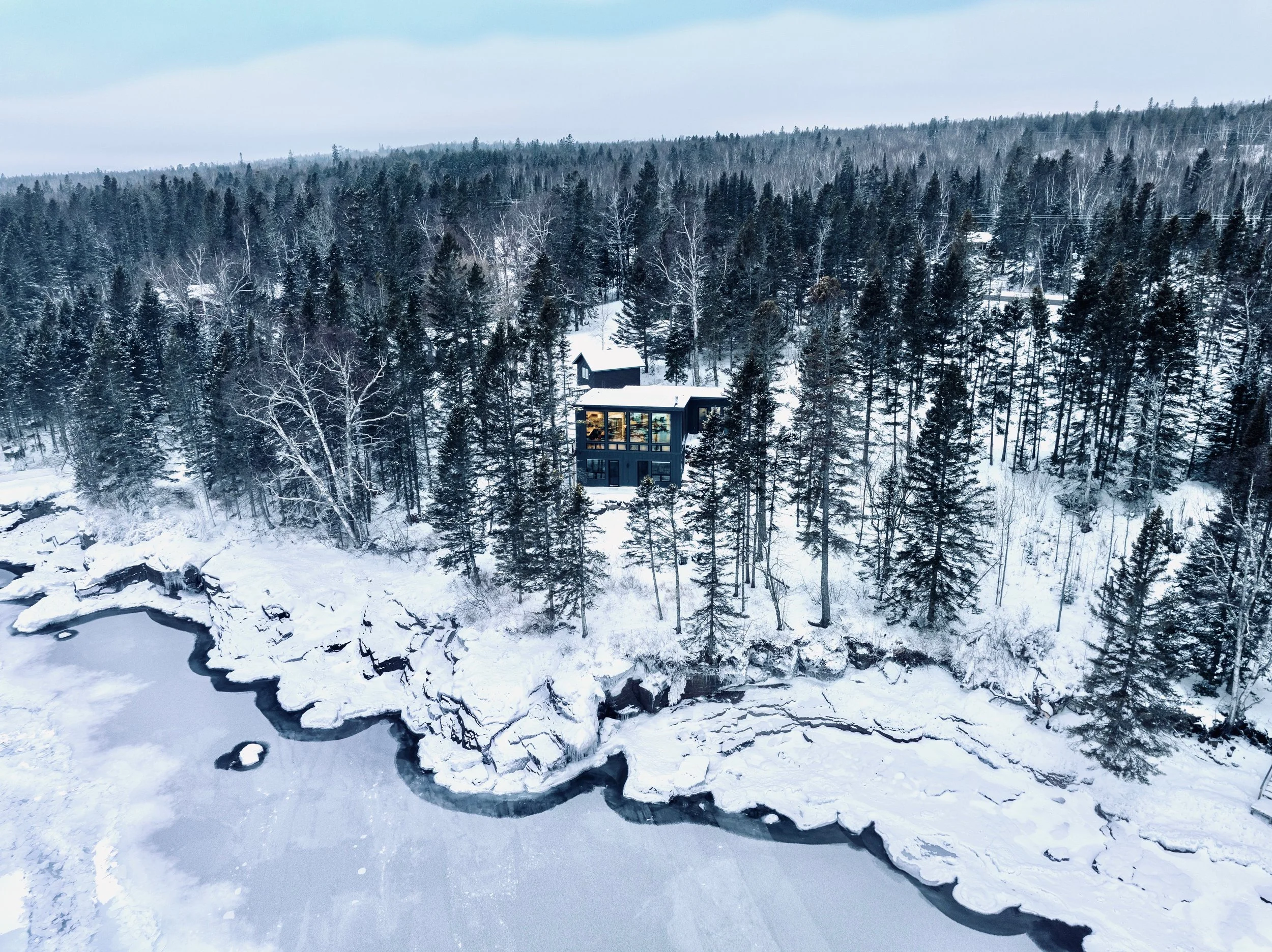 Shore and cabin from lake.jpeg