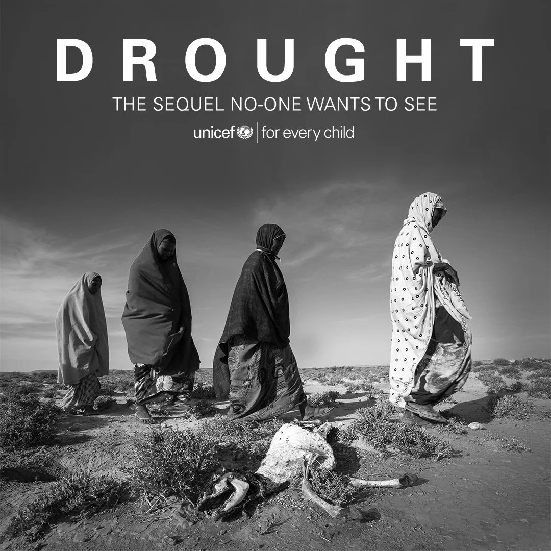 Somali women walking through drought-stricken landscape, social impact campaign for UNICEF by story agency STORO