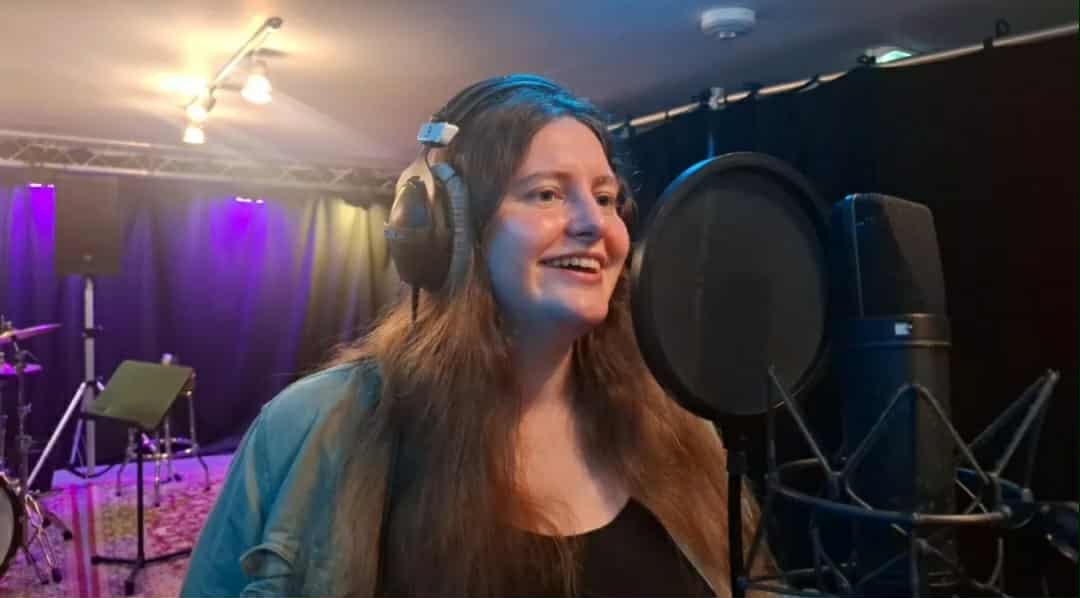Melissa recording the song 'Bread and Roses' for The End is Near.