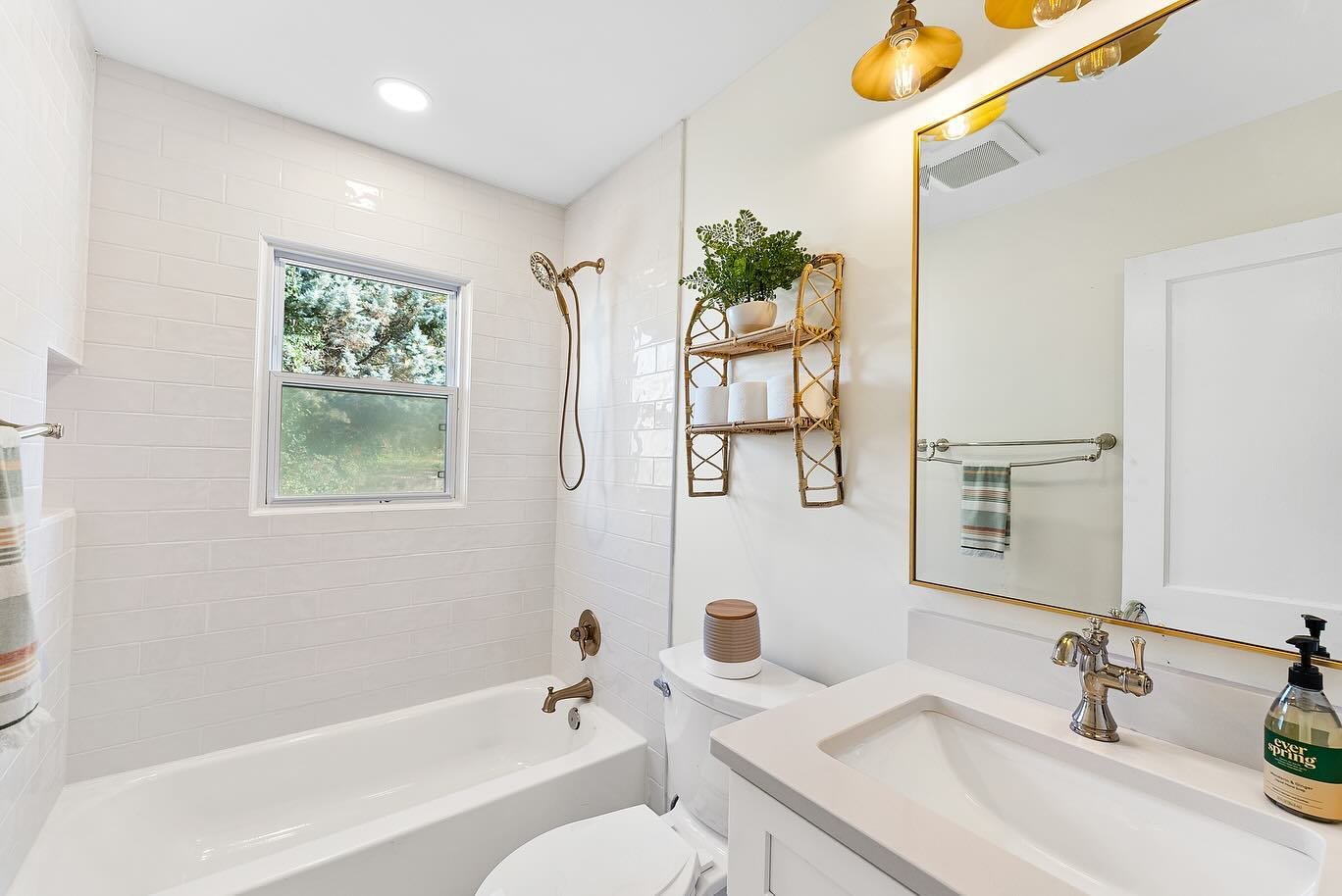 Check out this bathroom renovation in Mordecai. We took a quaint hallway bathroom and brightened it up with white subway tile and reflective surfaces. Swipe to see the transformation.