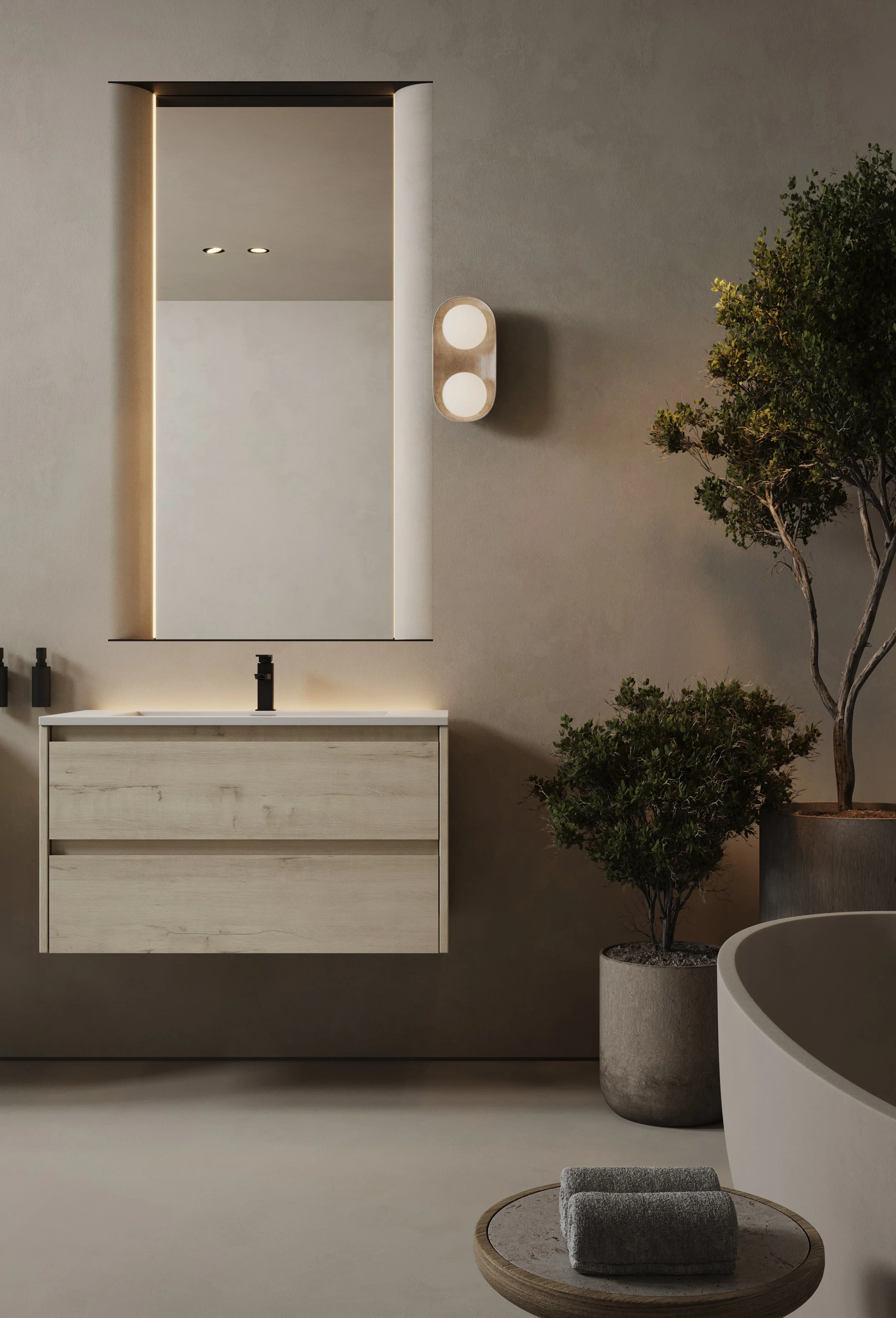 Minimalist bathroom with a modern sink and mirror, wall-mounted light, potted plants, round table with folded towels, and a circular bathtub.