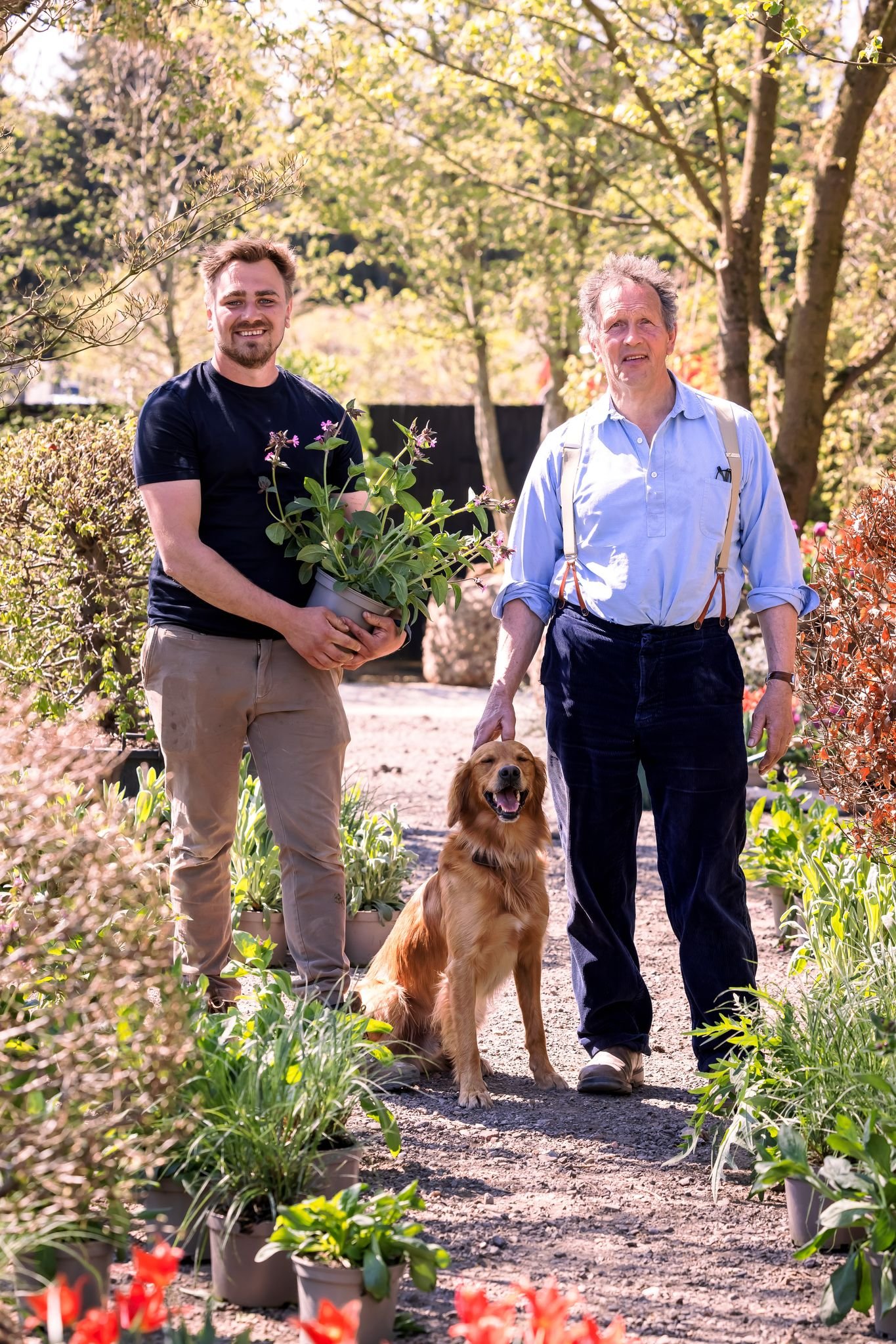 Jamie Butterworth and Monty Don with a golden retriever in the RHS and BBC Radio 2 Dog Garden, RHS Chelsea Flower Show 2025
