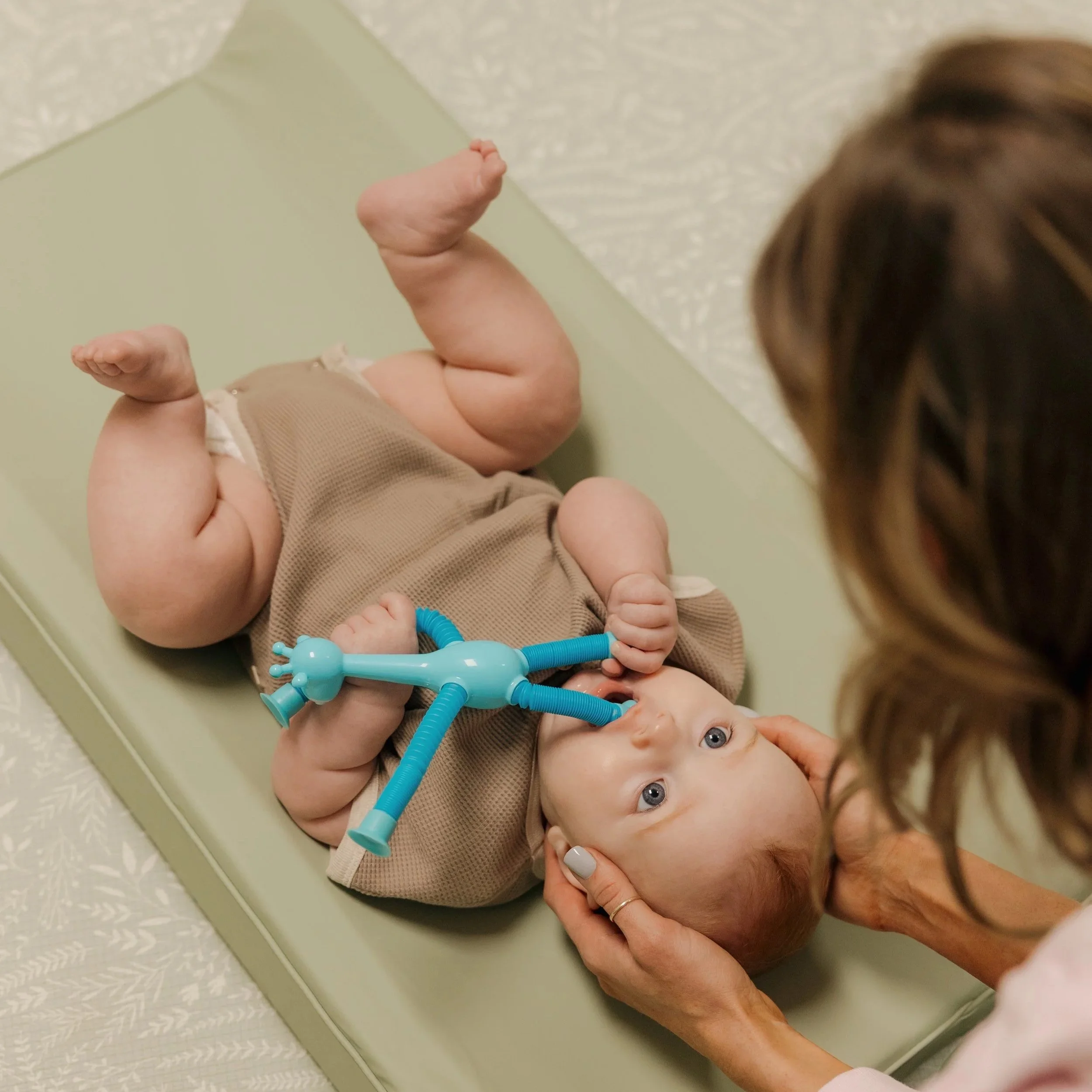 Baby chiropractic adjustment