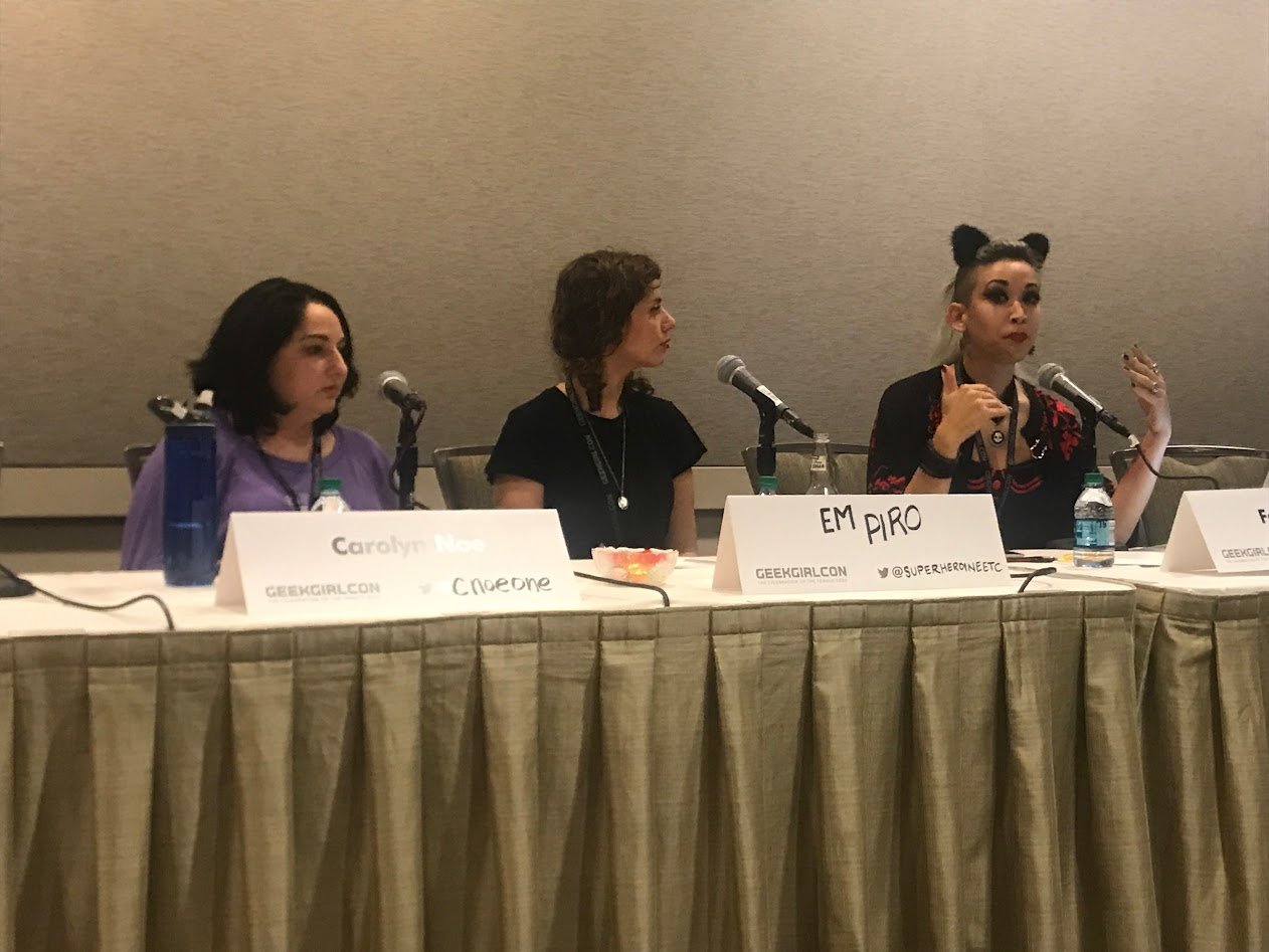 Three SHE volunteers at a GeekGirlCon panel
