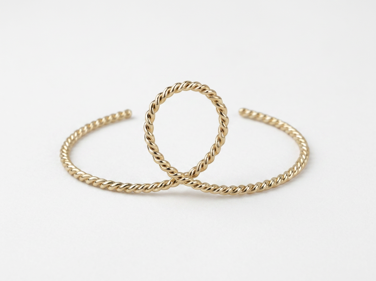 THE GOLD TWIST MEMORY BANGLE